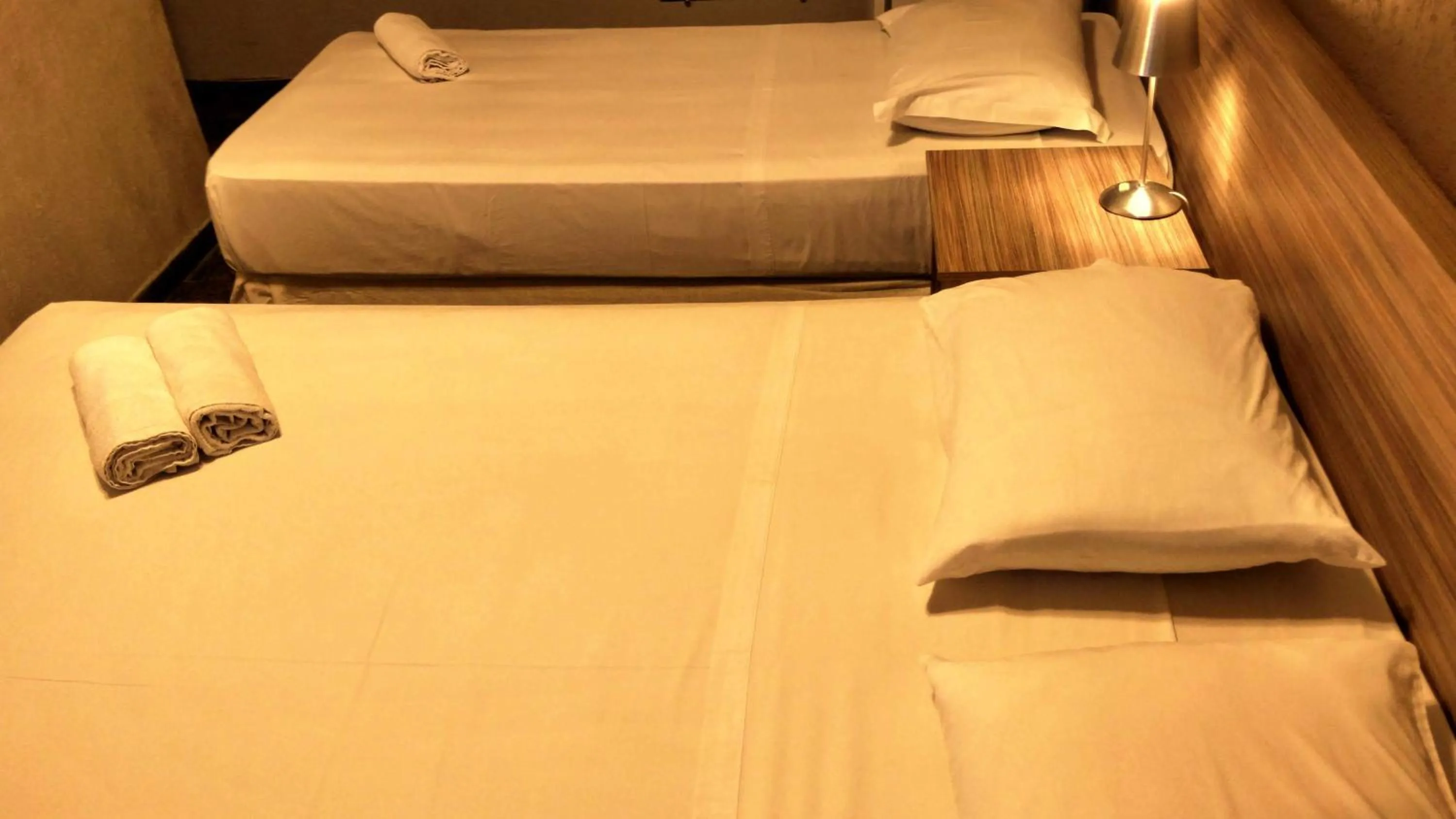 Bed in Hotel Imperador