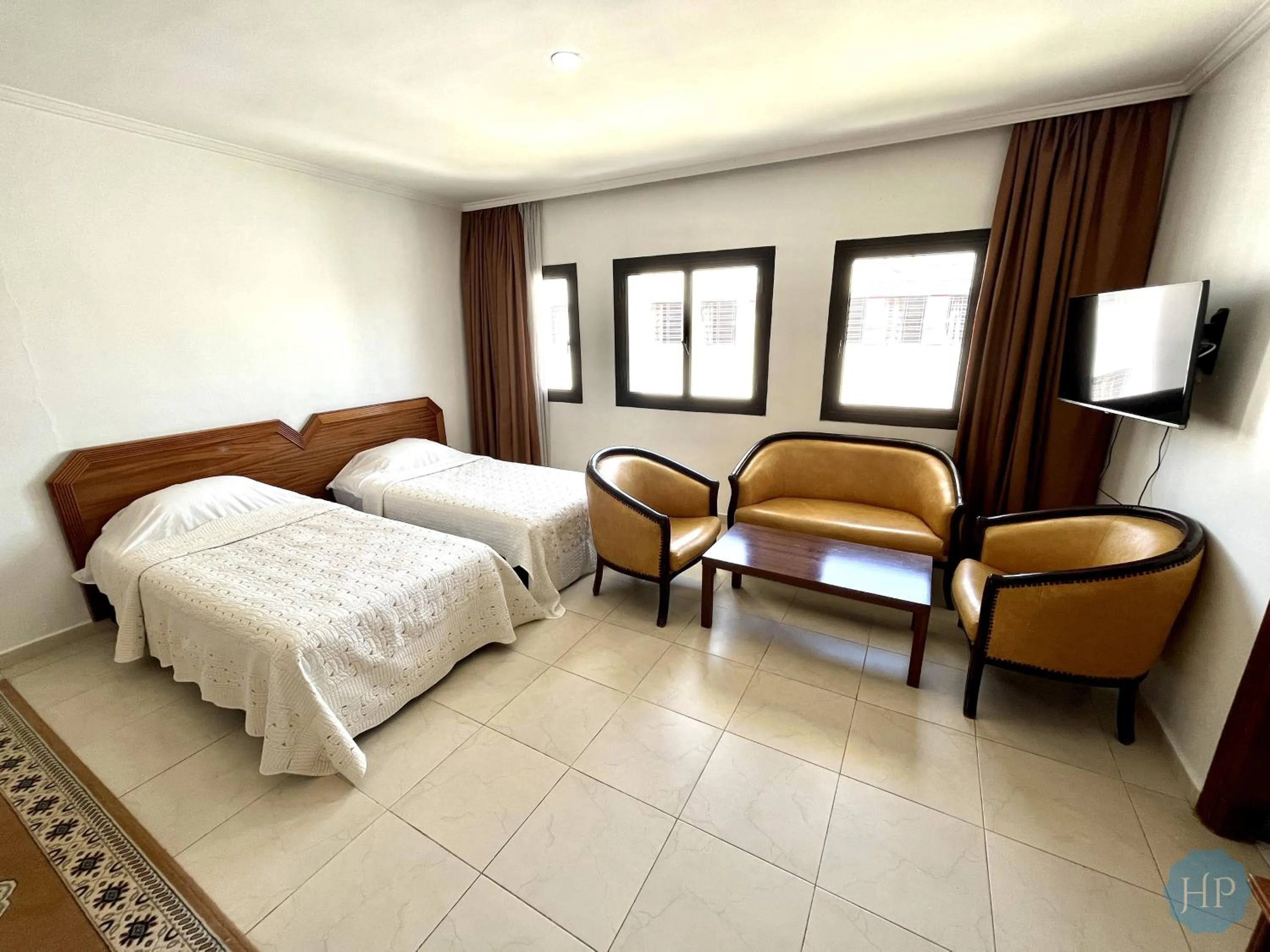 Seating area, Bed in Hôtel Plaisance