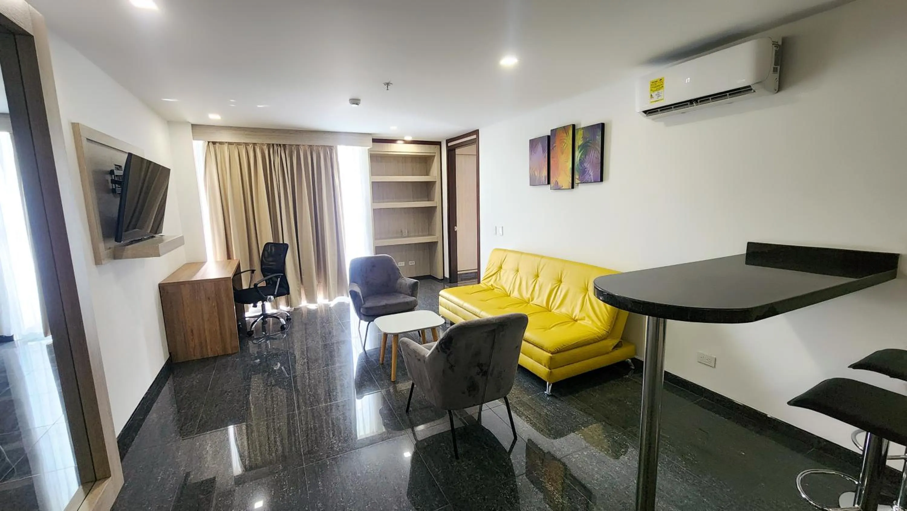 Living room in BE Suites Hotel Cali