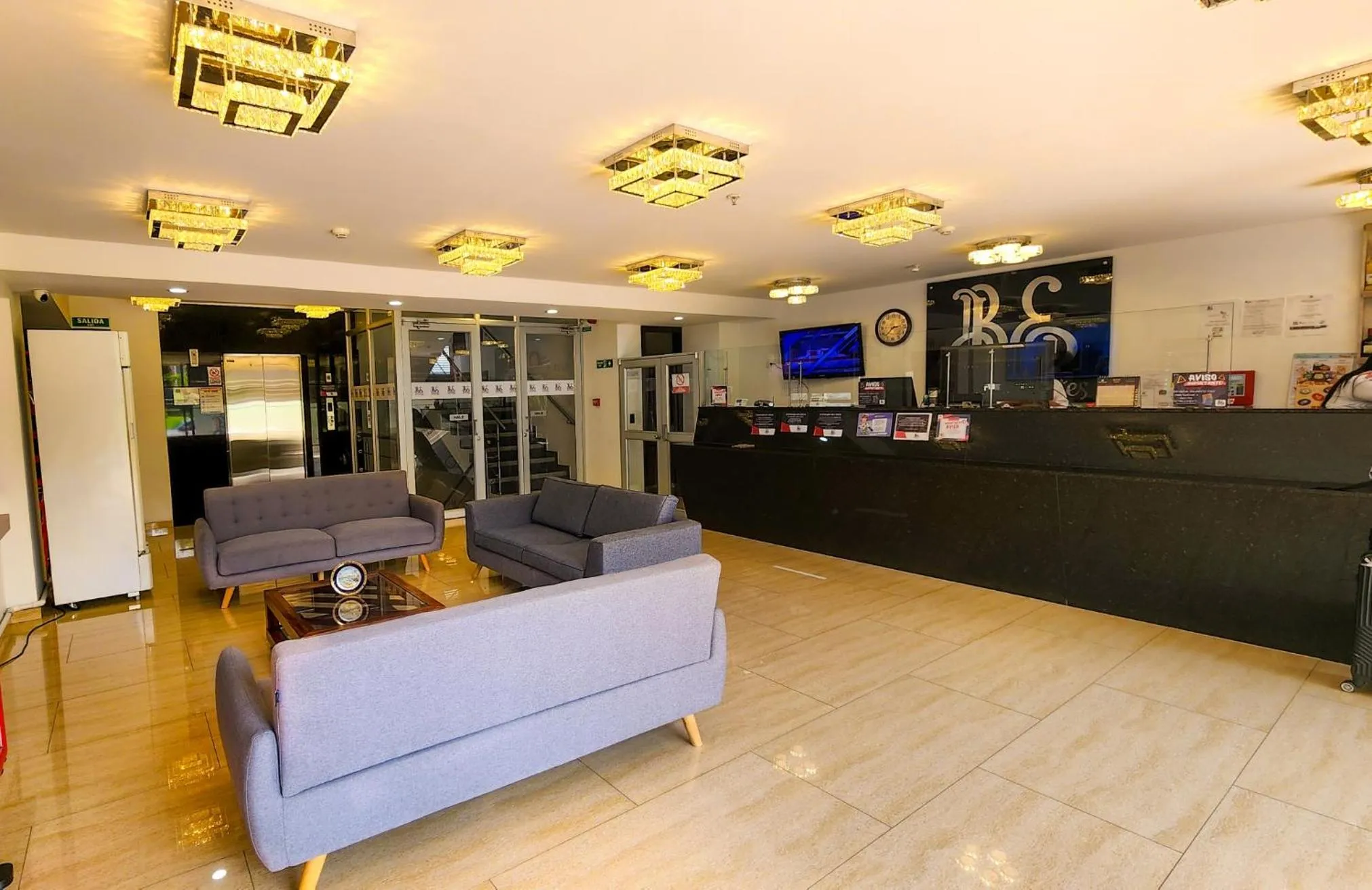 Lobby or reception in BE Suites Hotel Cali