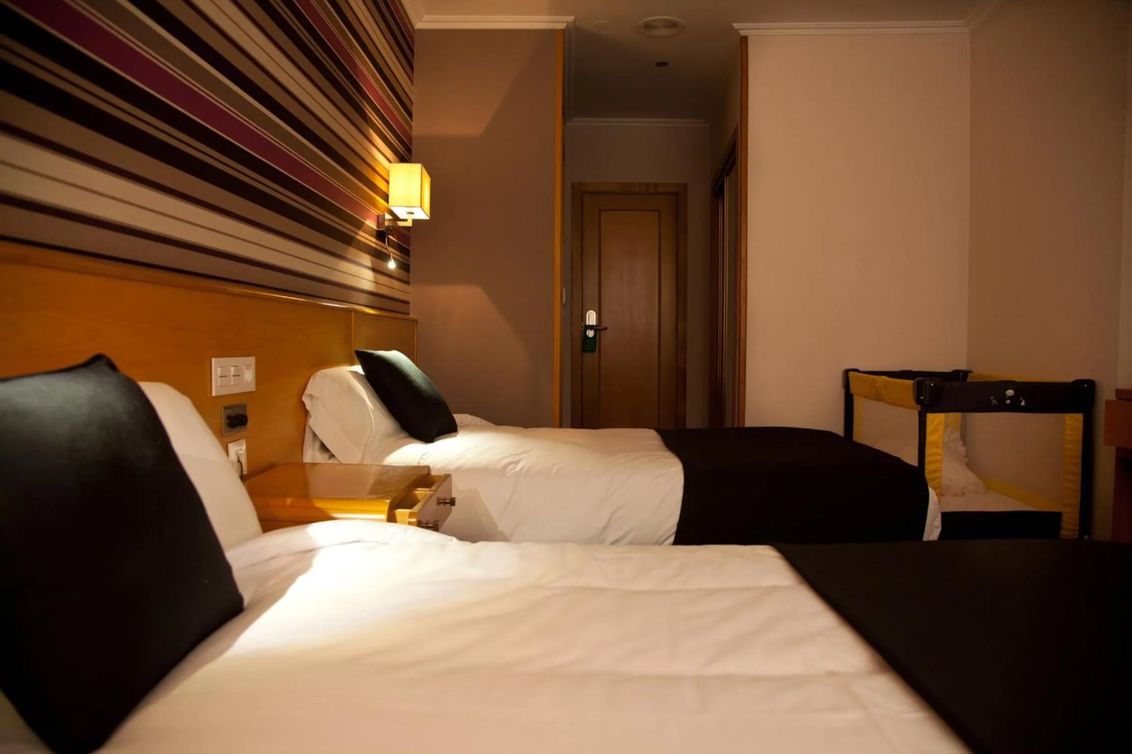 Bed in Hotel Palacio de Cristal