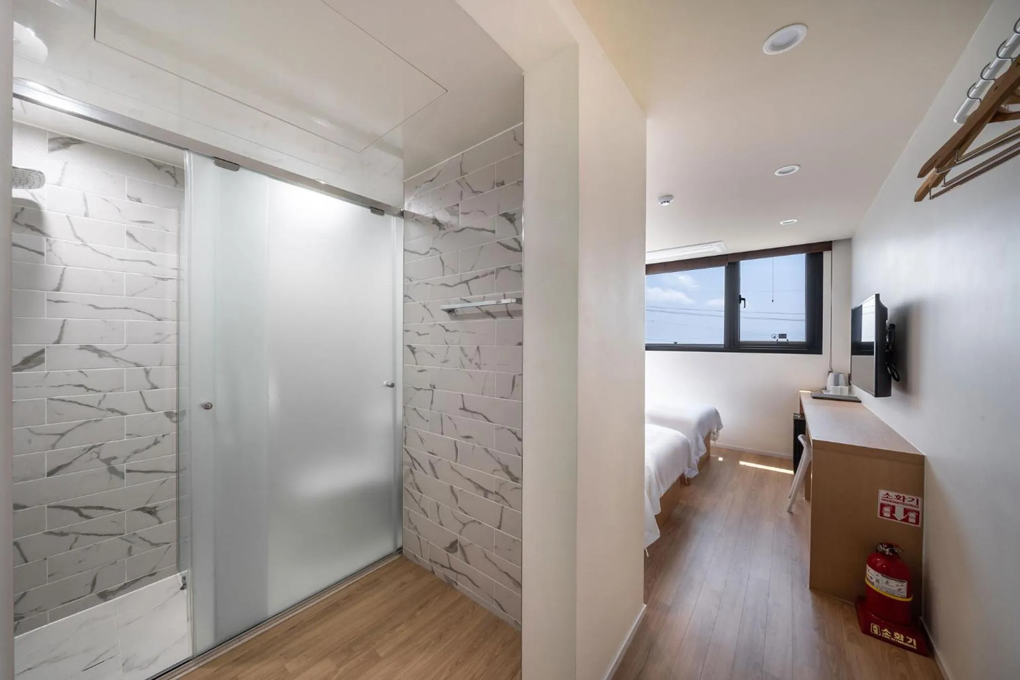 Bathroom in Aroomi Hotel