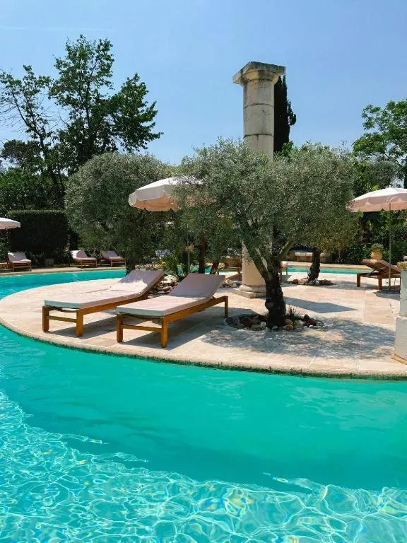 Swimming pool in Hotel Les Messugues
