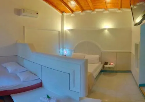 Photo of the whole room, Bed in Hotel Cocoliso Island Resort