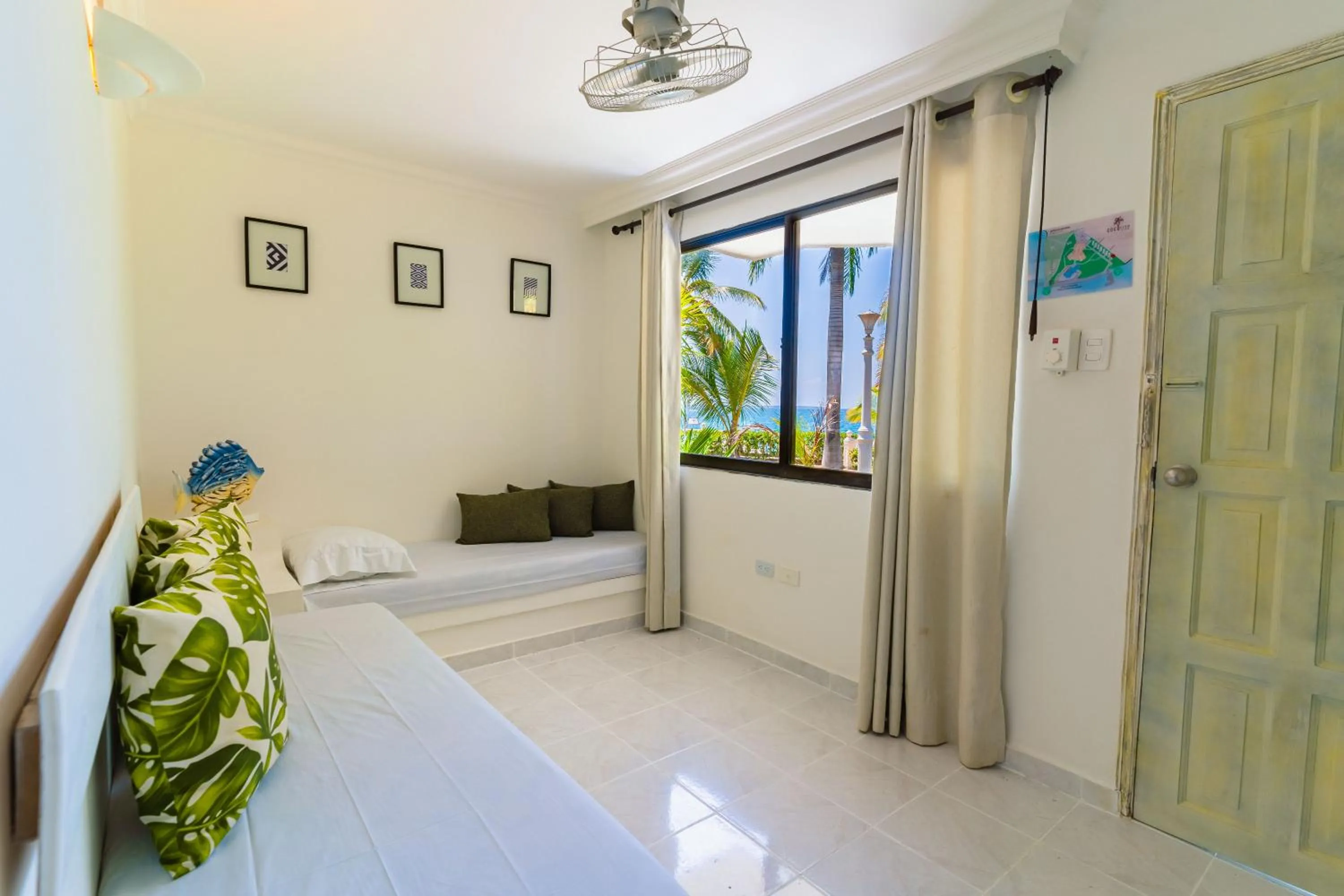 View (from property/room), Bed in Hotel Cocoliso Island Resort