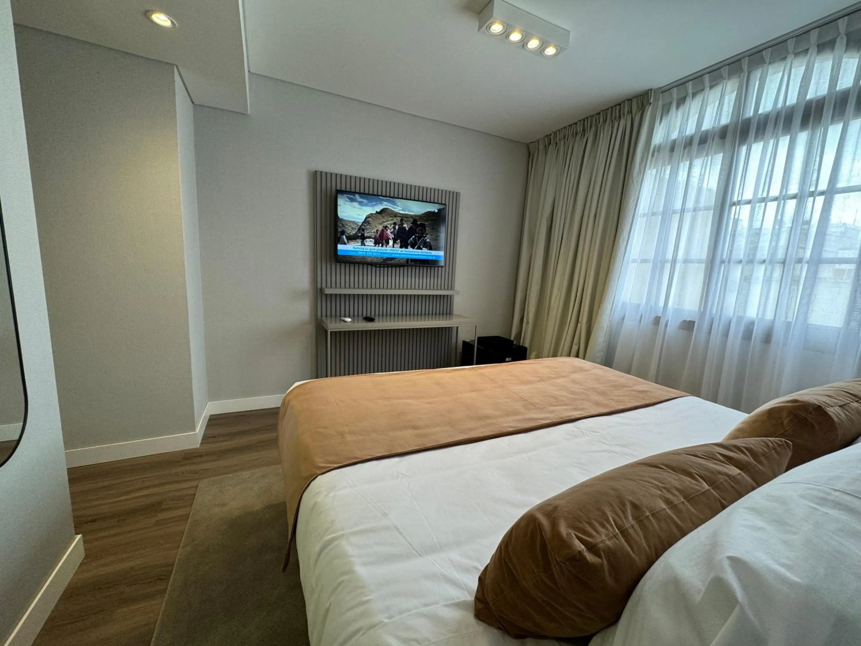 Bed in Guemes Hotel & Spa