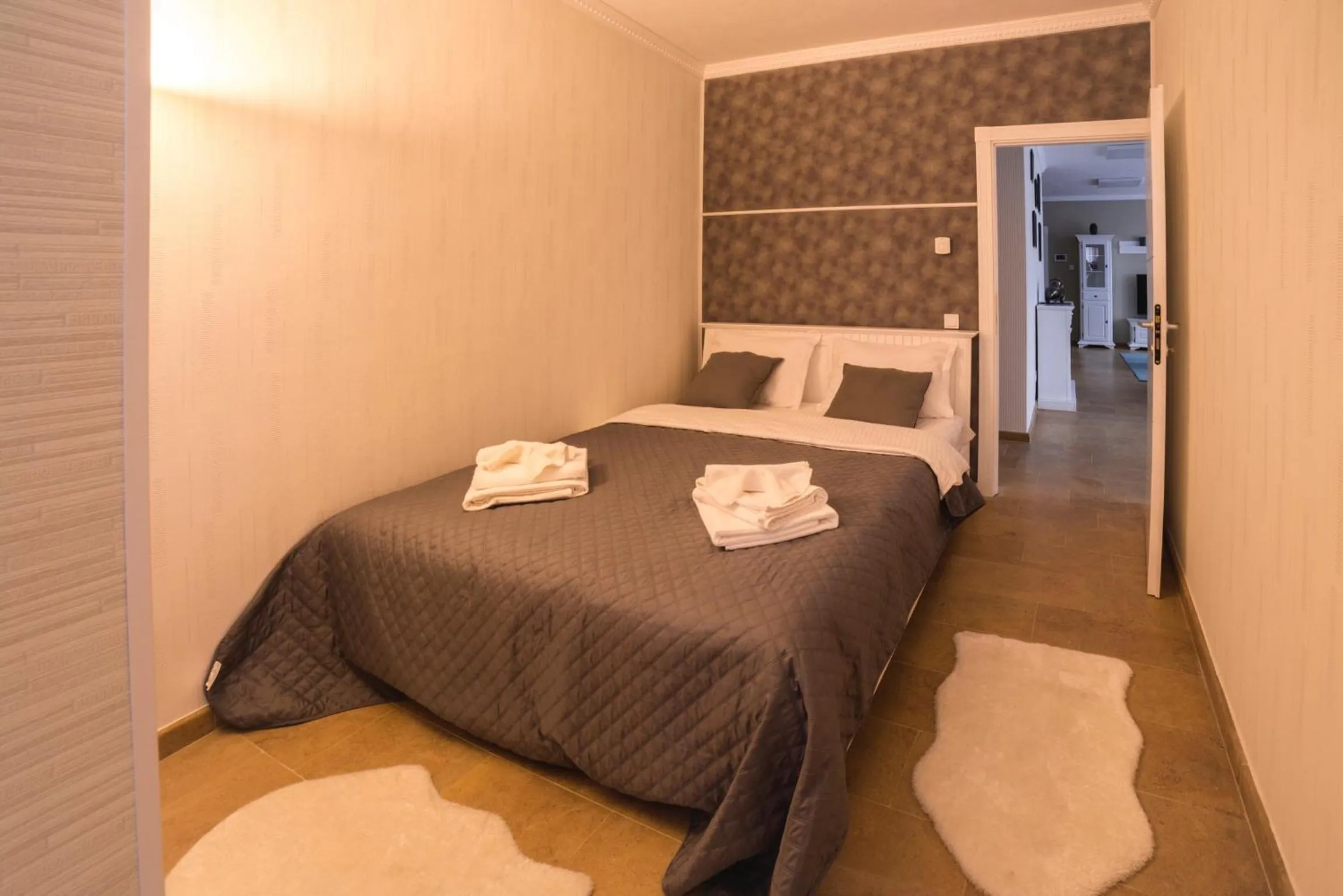 Bed in Lira Holiday Apartments