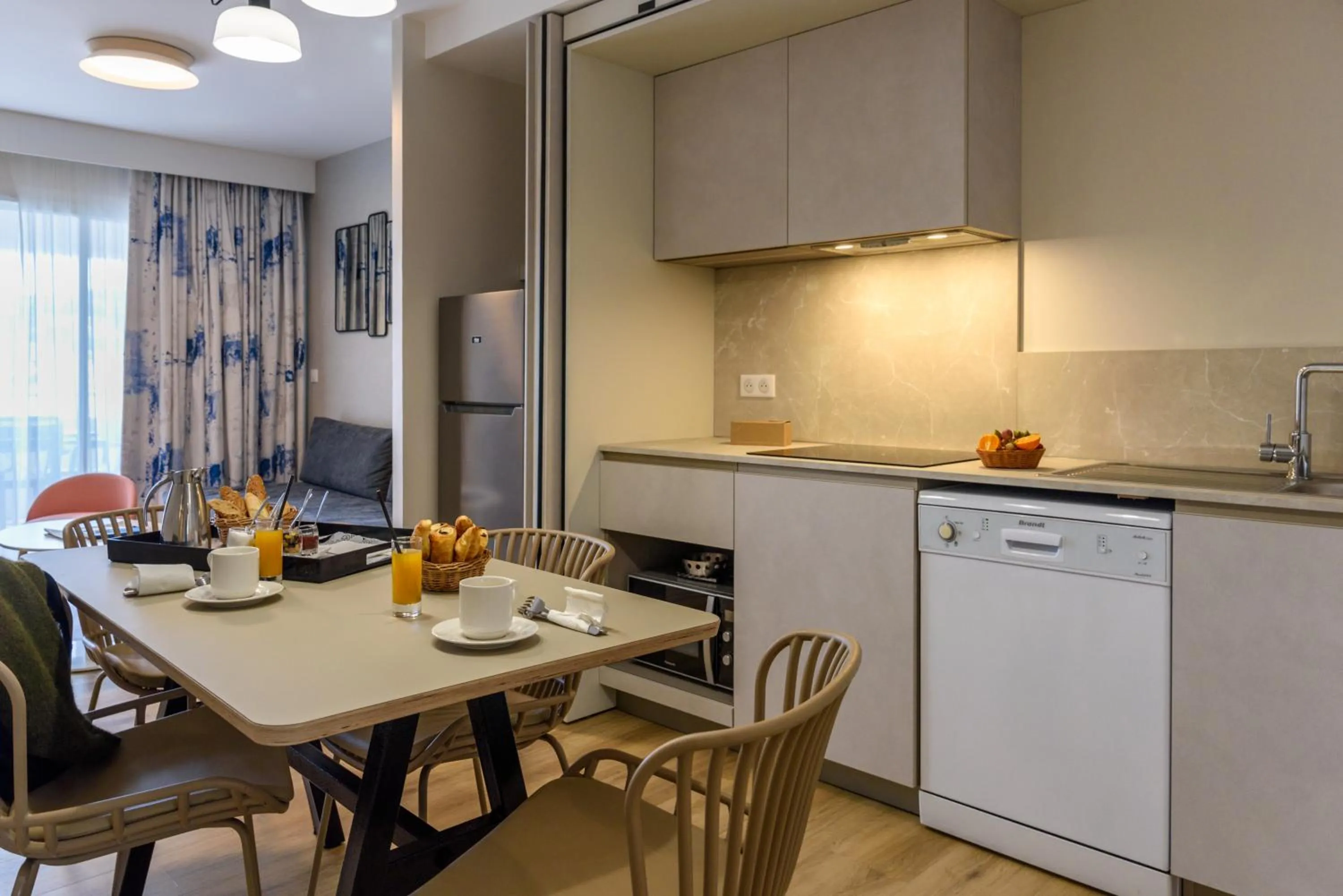 Kitchen or kitchenette in Residence de Tourisme Ajaccio Amirauté