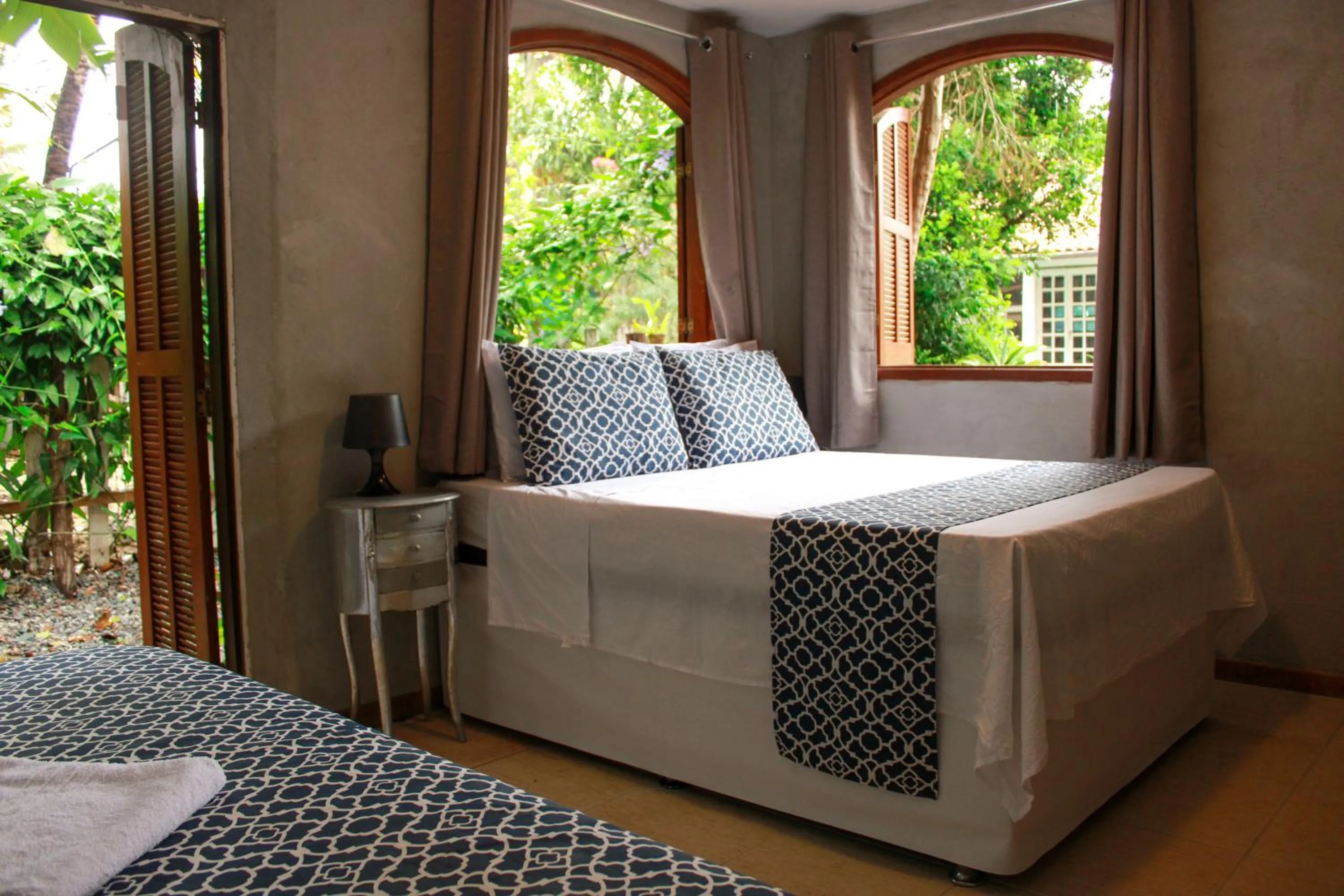 Bed in Jardim Secreto Guest House