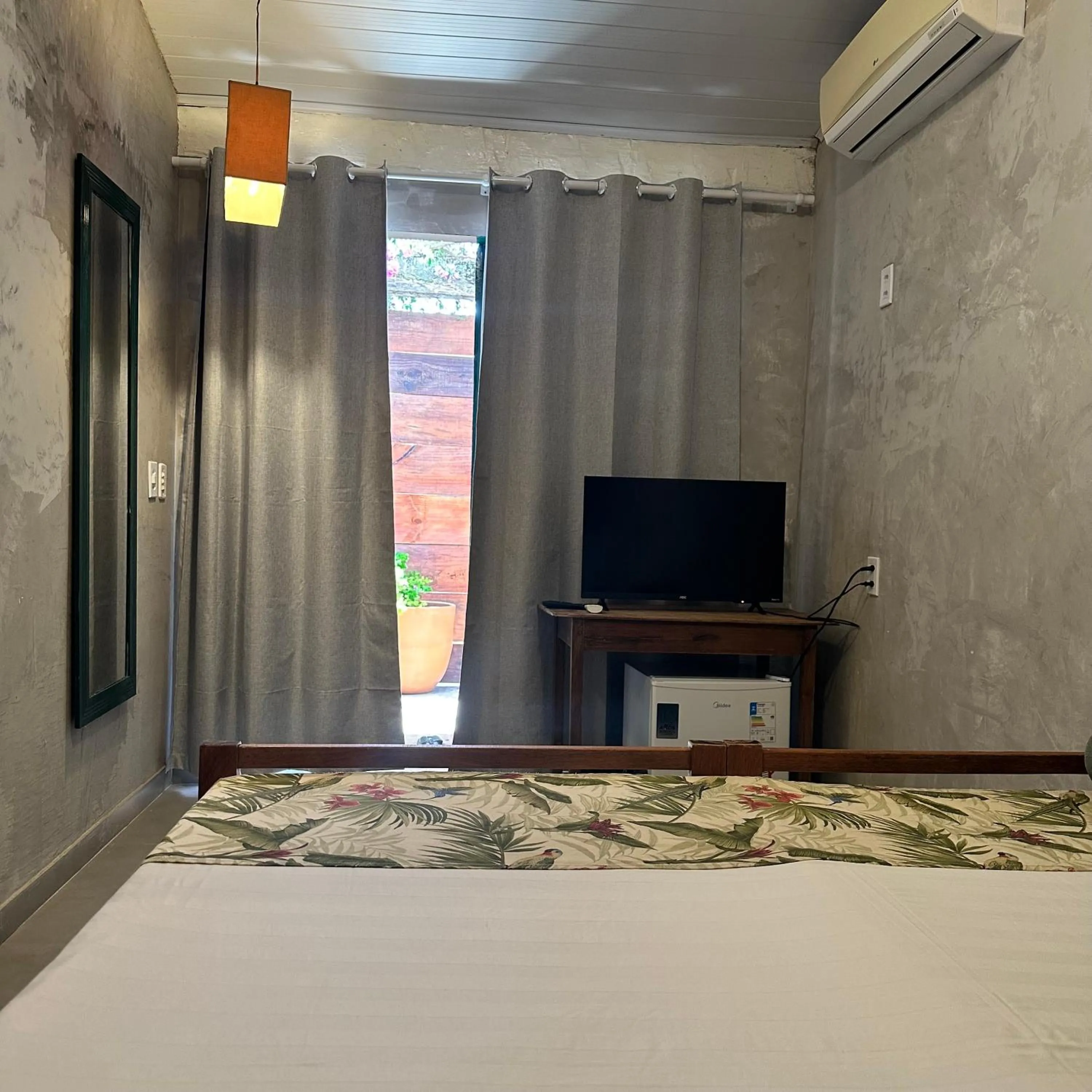 Bed in Jardim Secreto Guest House