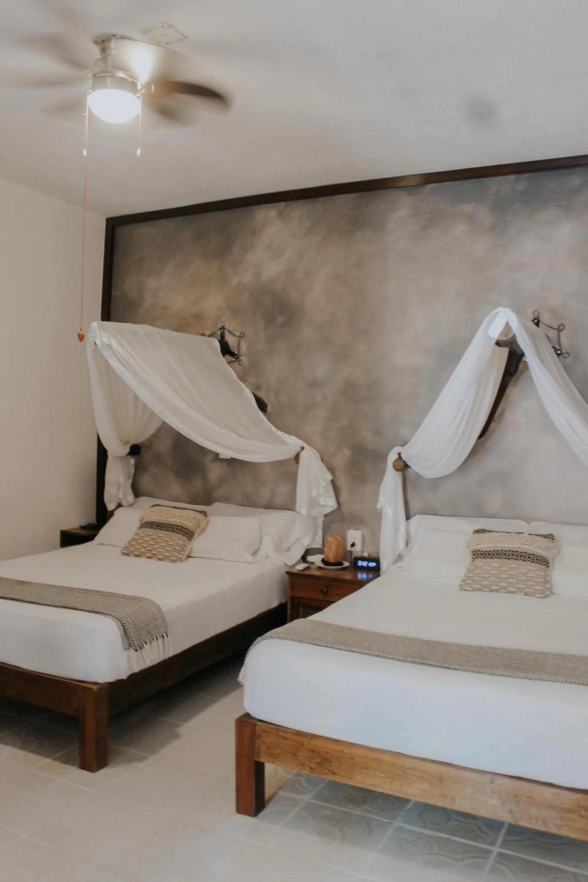 Bed in Casa de Olas Boutique Hotel