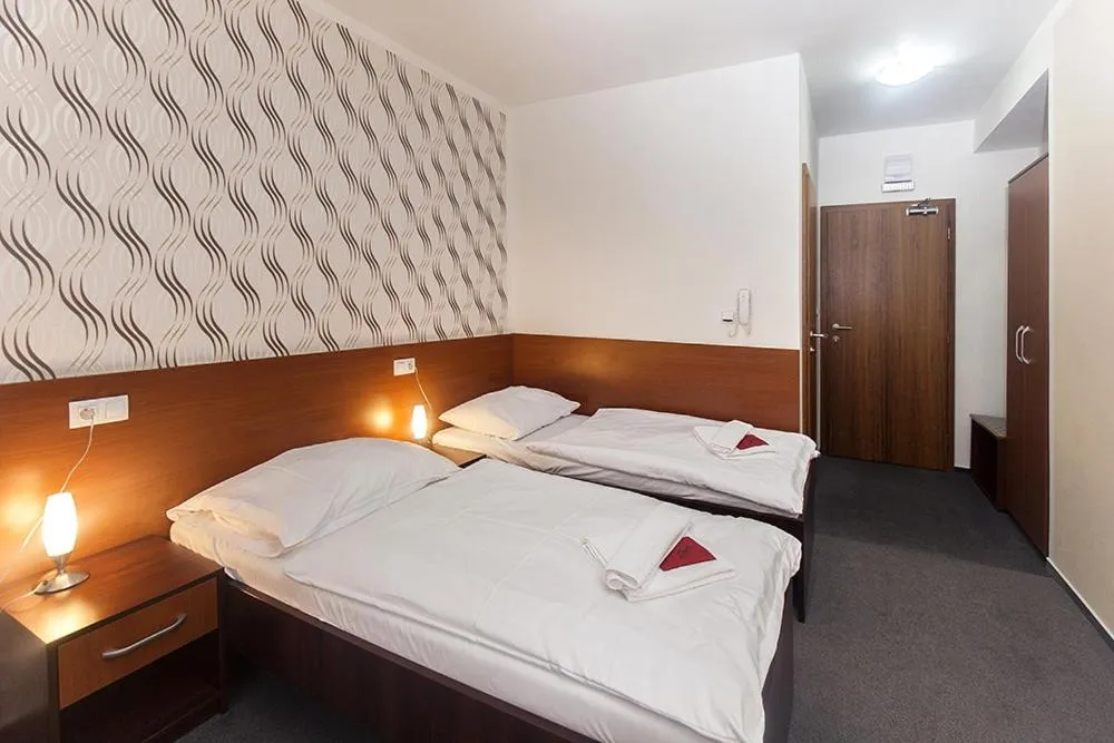 Bed in Hotel Arkáda