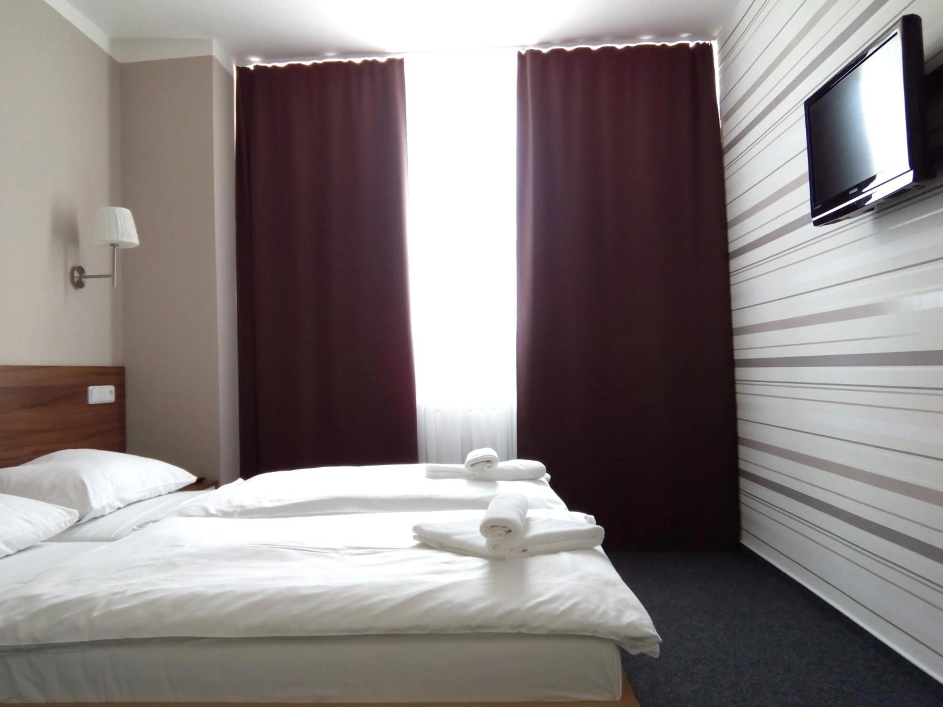 Photo of the whole room, Bed in Hotel Arkáda