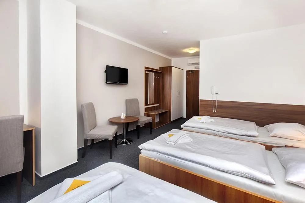 Bed in Hotel Arkáda