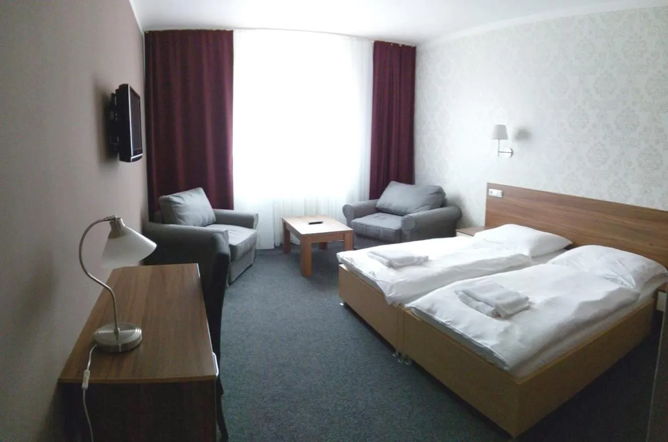 Bed in Hotel Arkáda