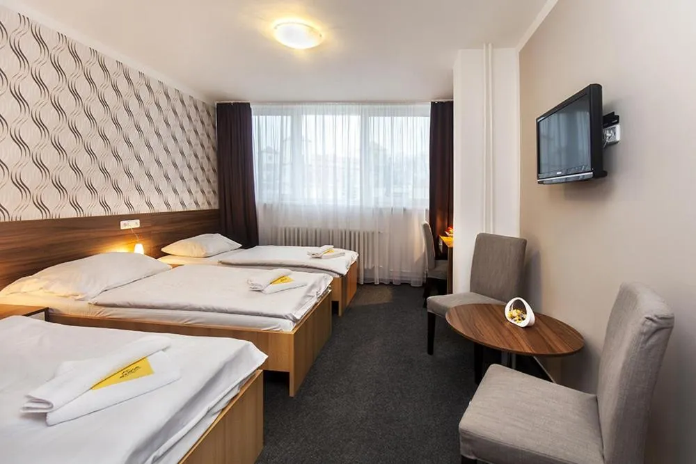 Bed in Hotel Arkáda