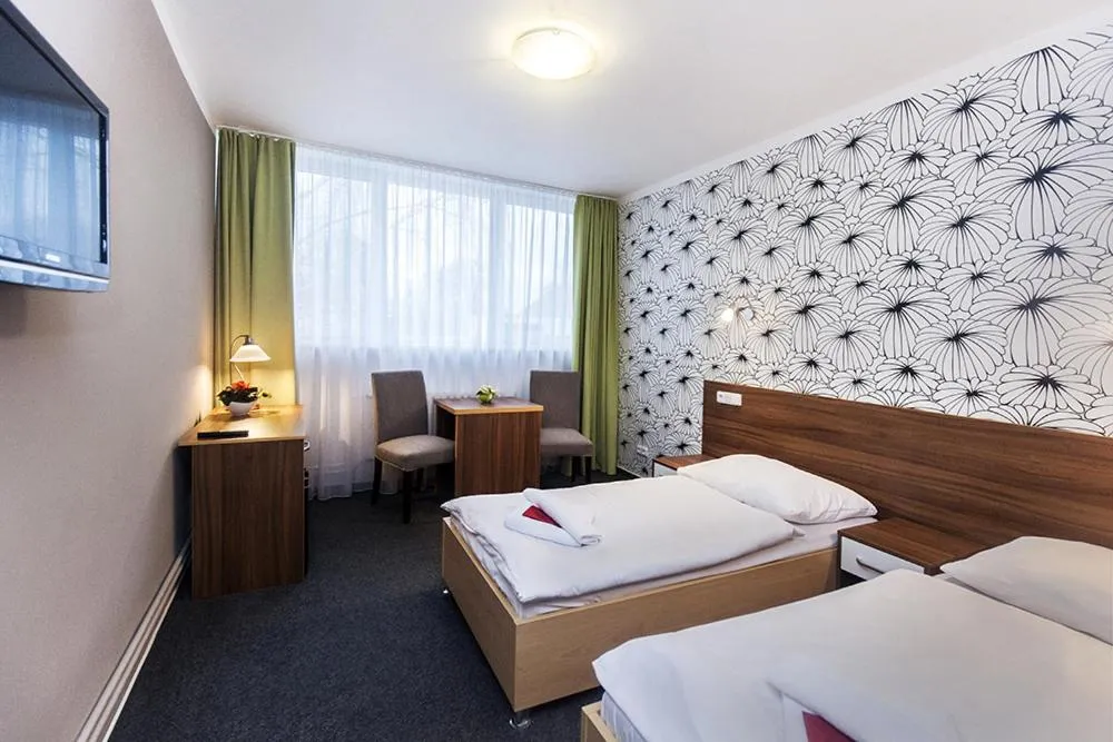 Bed in Hotel Arkáda