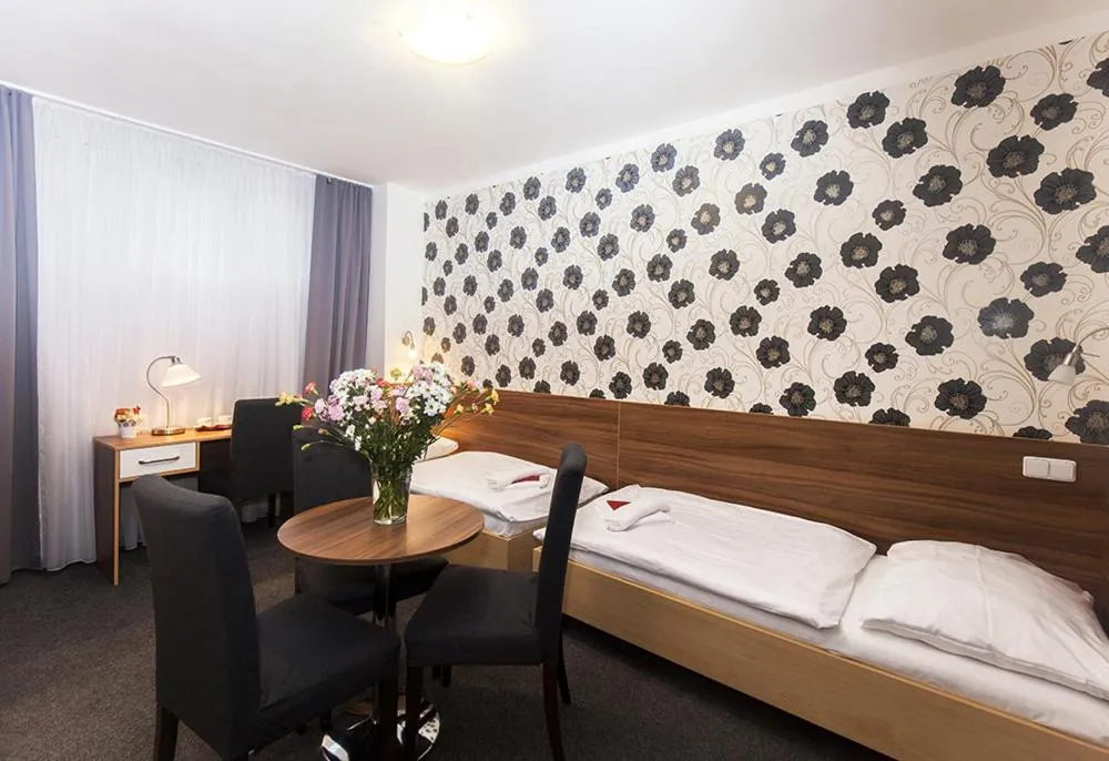 Bed in Hotel Arkáda