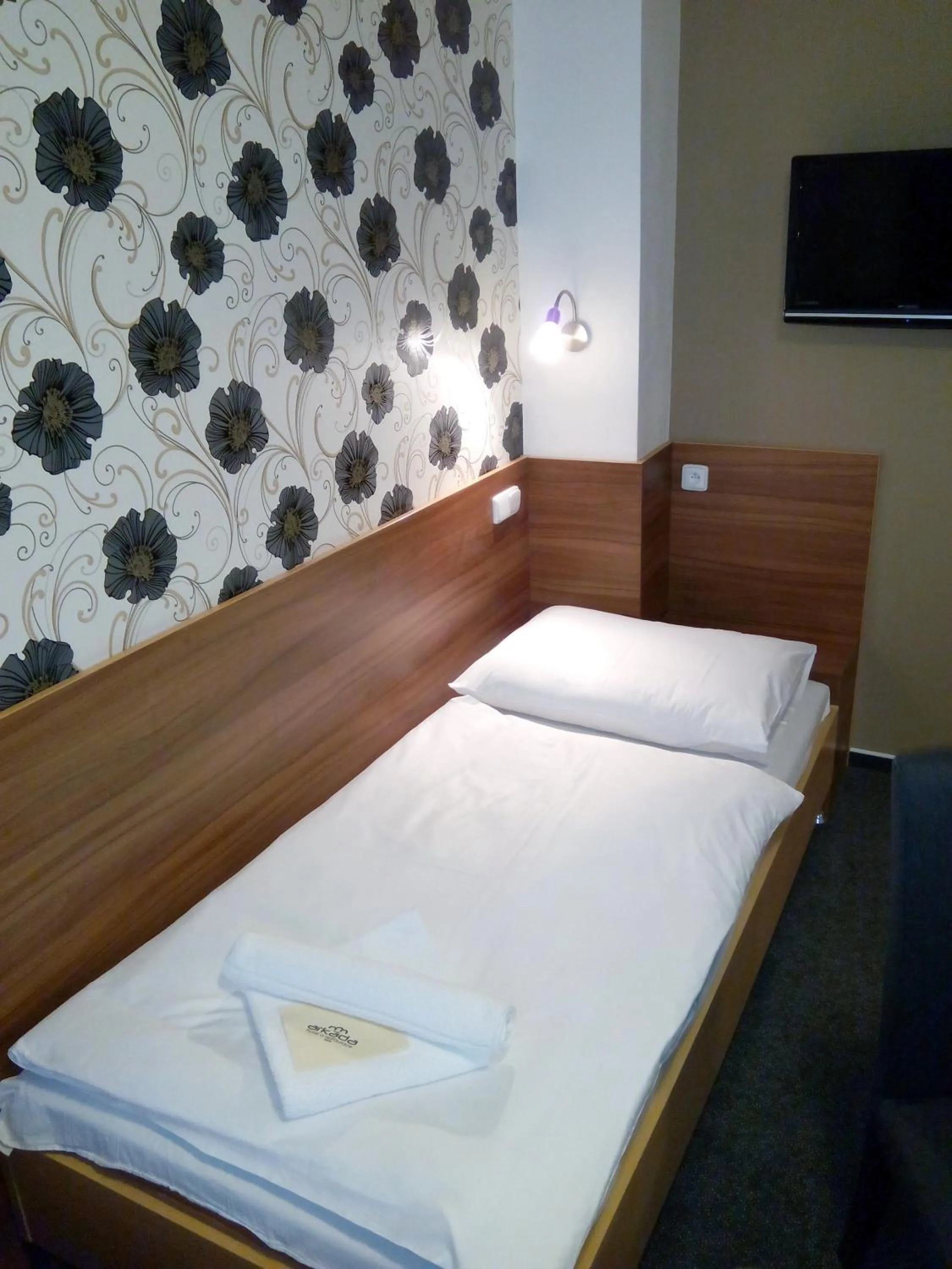 Photo of the whole room, Bed in Hotel Arkáda