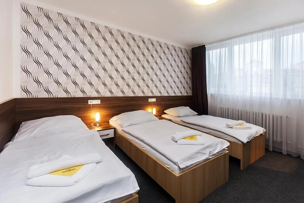 Bed in Hotel Arkáda