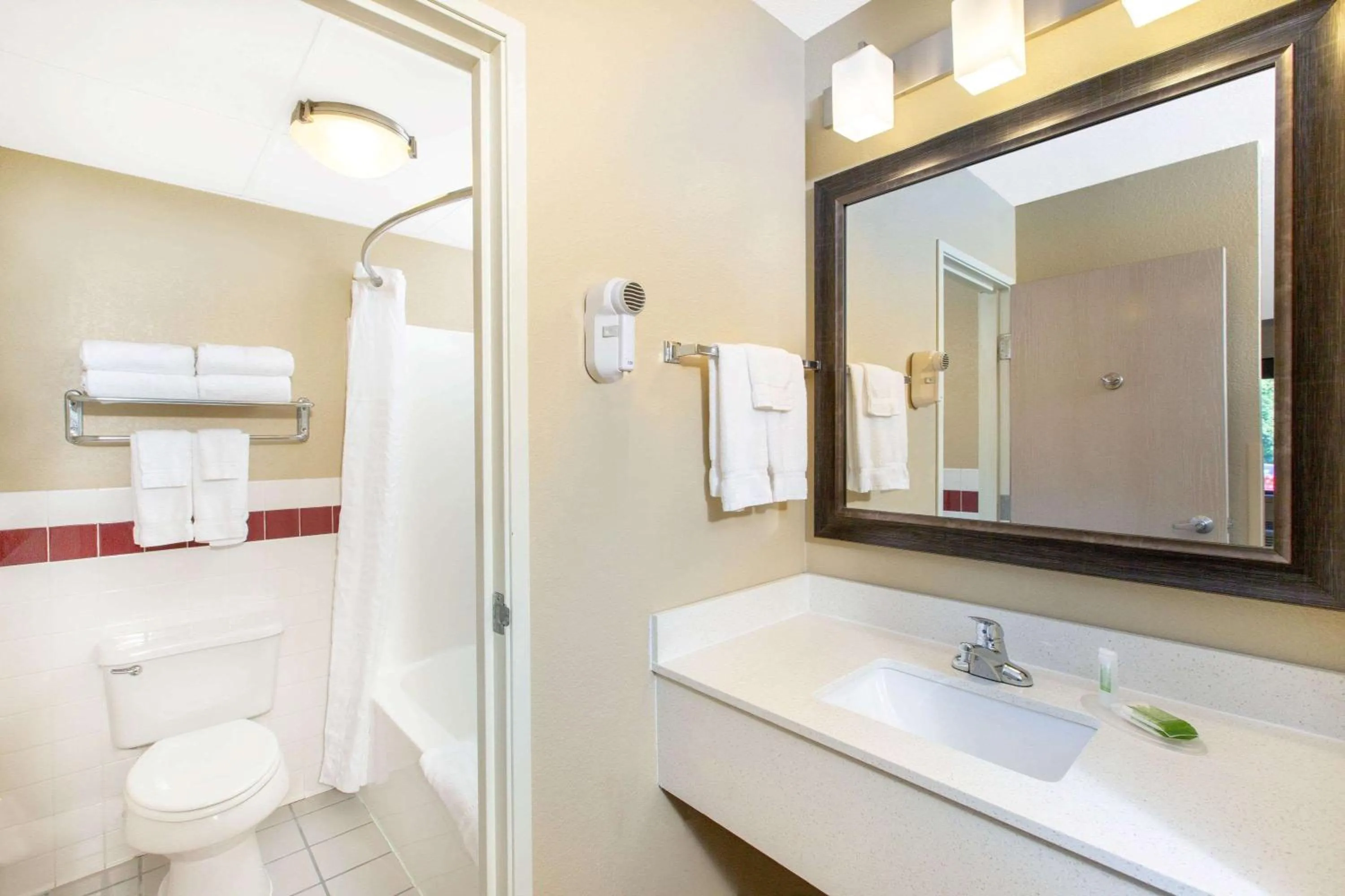 Bathroom in AmericInn by Wyndham Okoboji