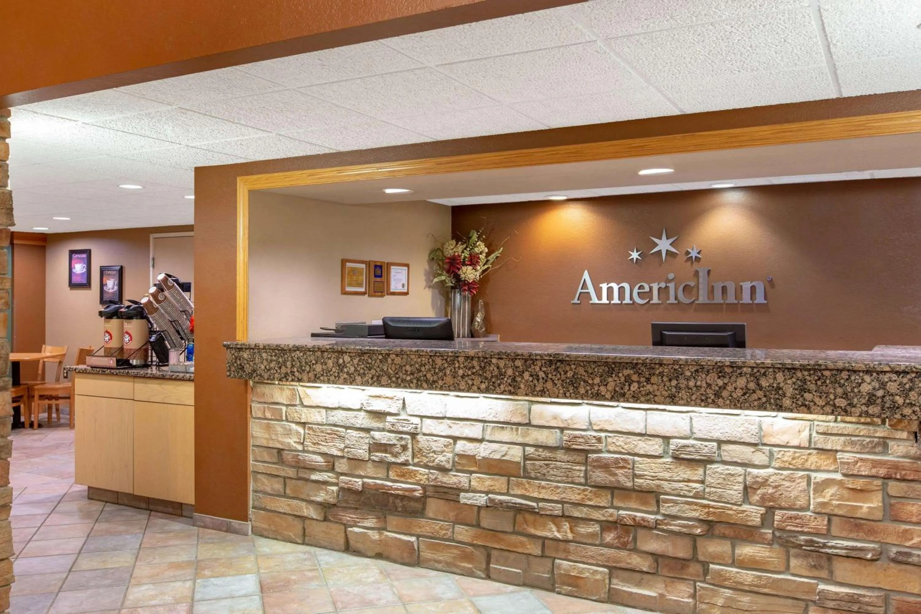 Lobby or reception in AmericInn by Wyndham Okoboji