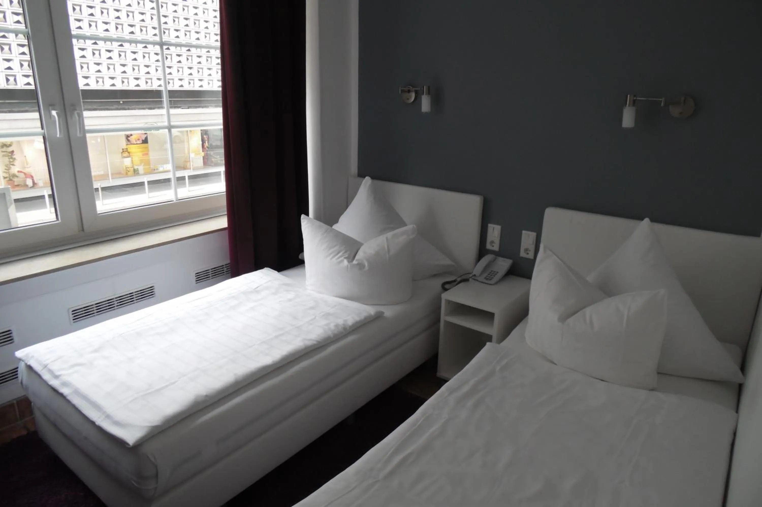 Bed in Rheinmetropole Hotel