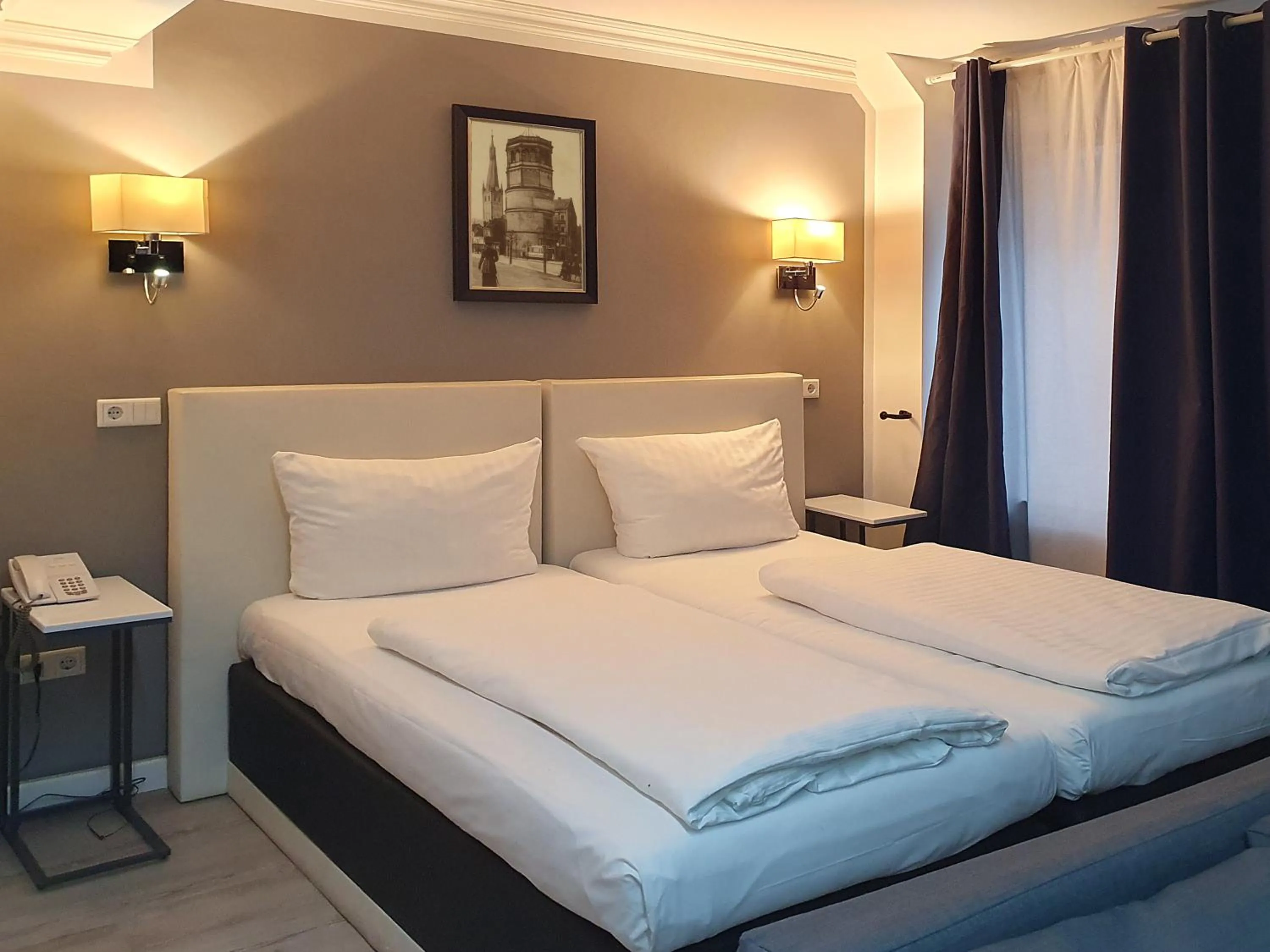 Bed in Rheinmetropole Hotel
