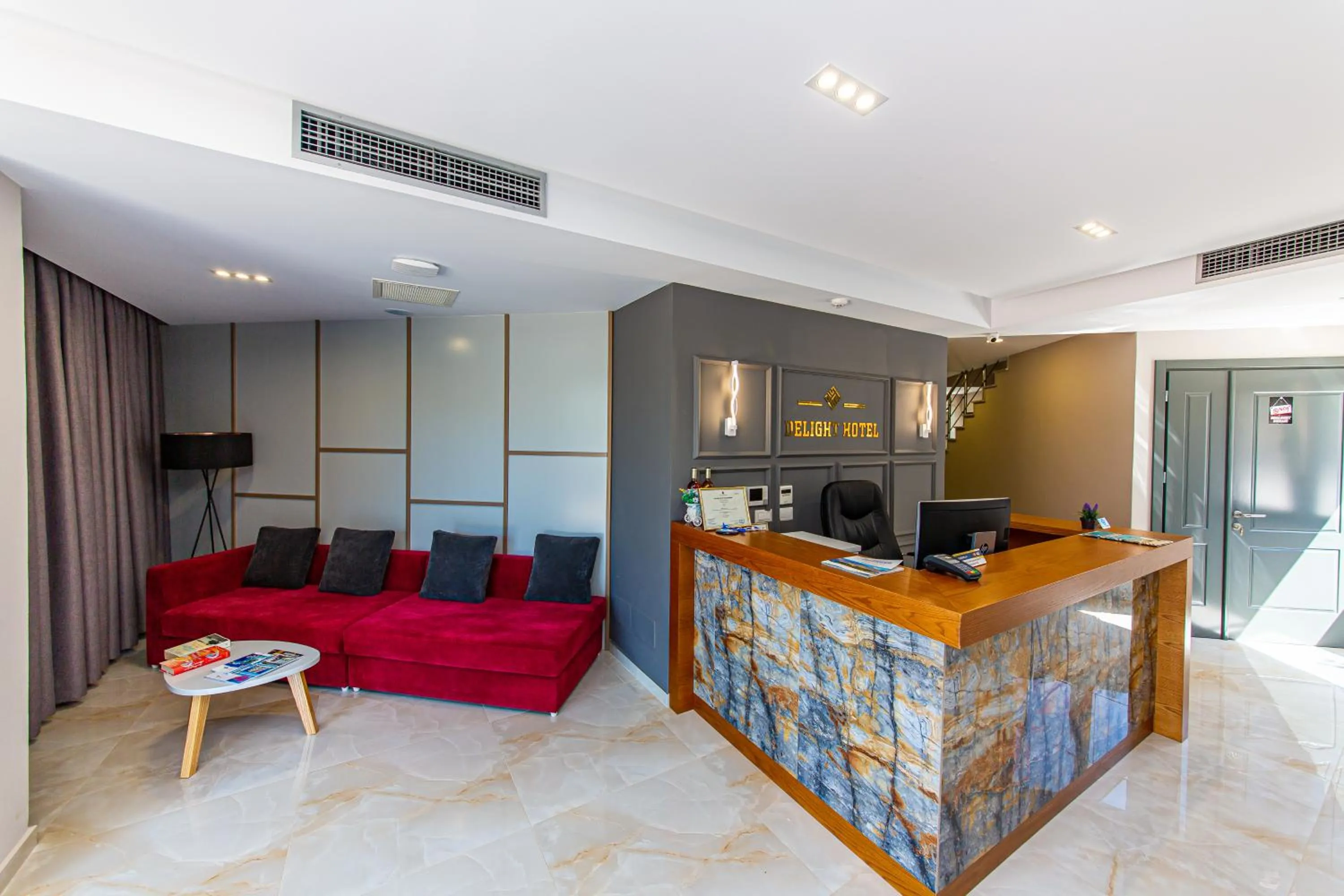 Lobby or reception in Delight Hotel