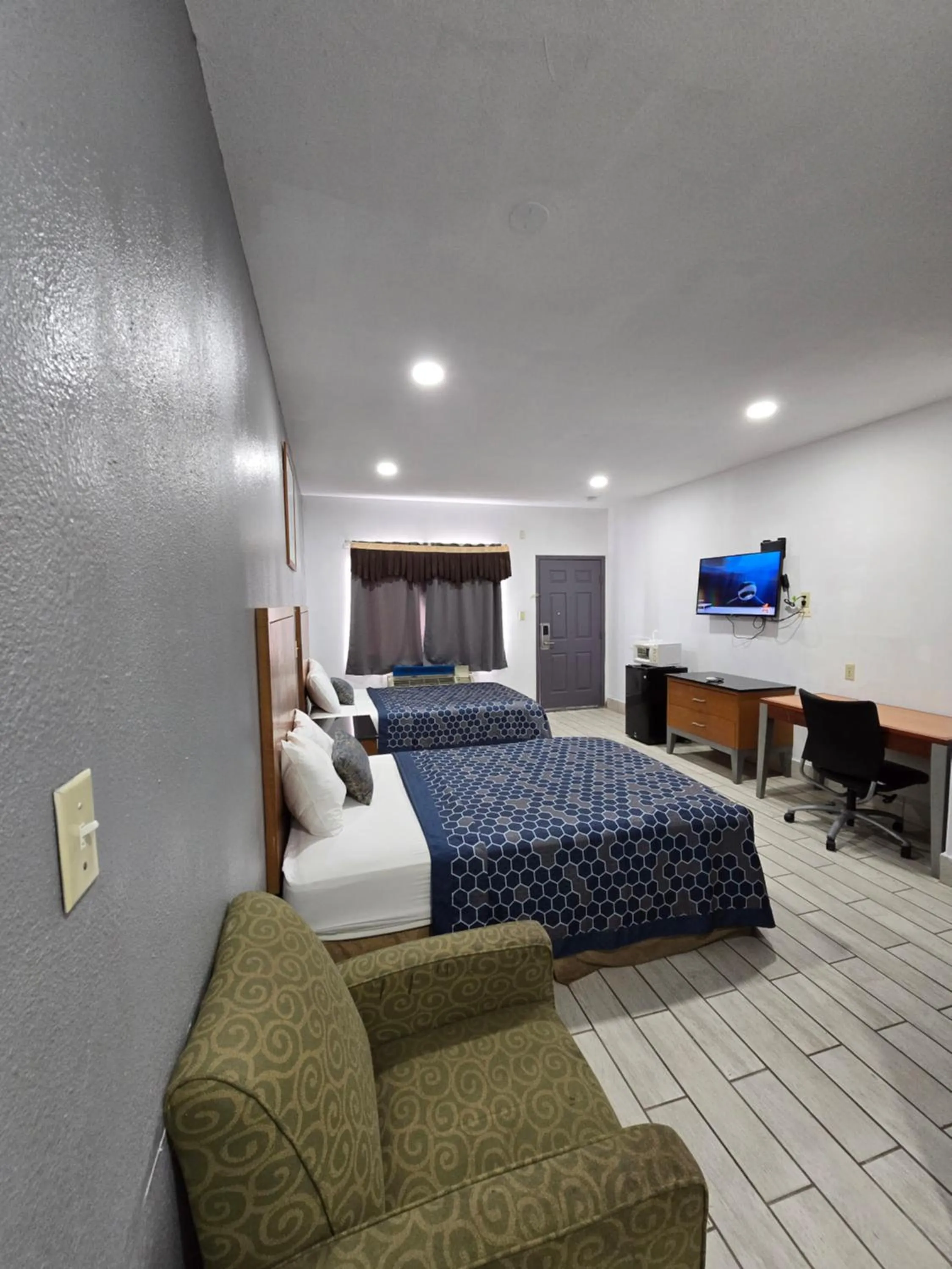 Photo of the whole room, Bed in Executive Inn Laguna Vista