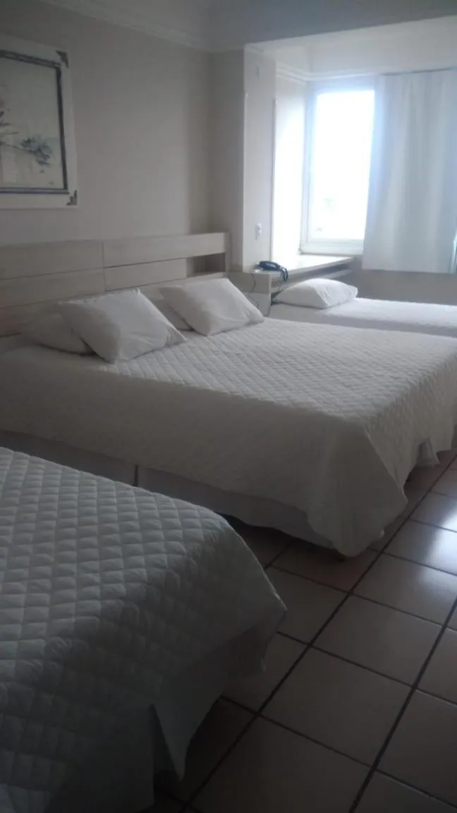 Bed in Hotel Araçá