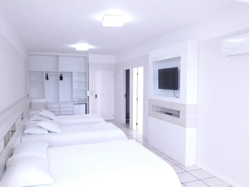 Bed in Hotel Araçá