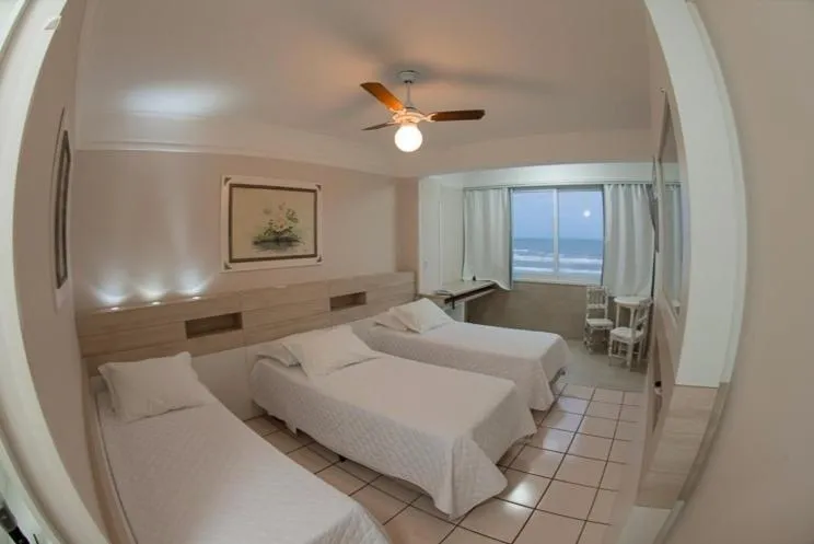 Bed in Hotel Araçá