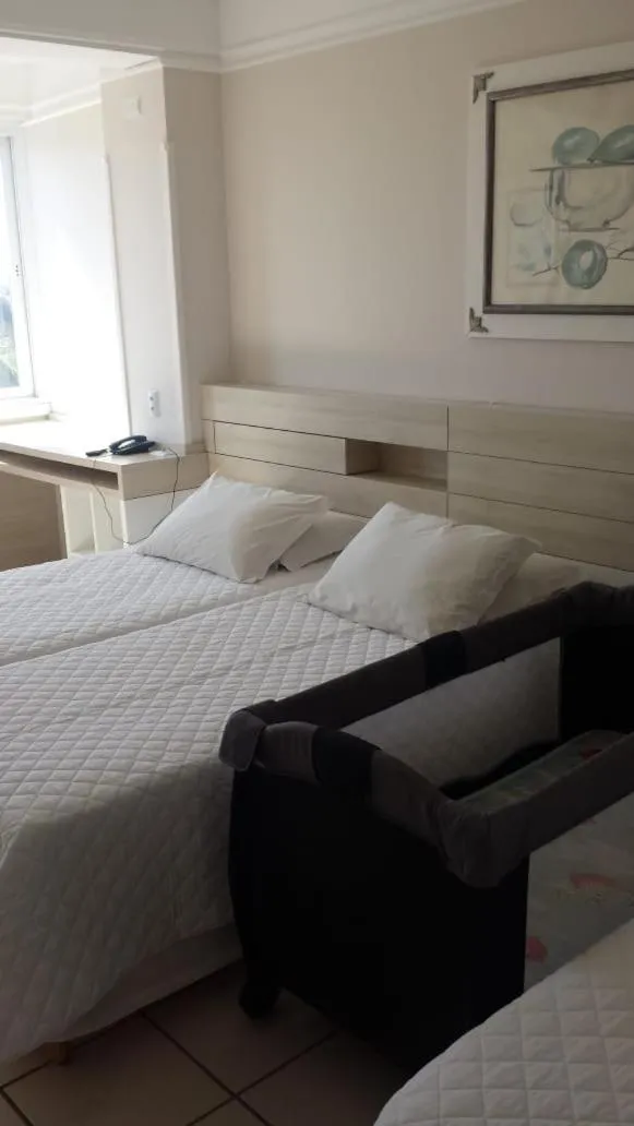 Bed in Hotel Araçá