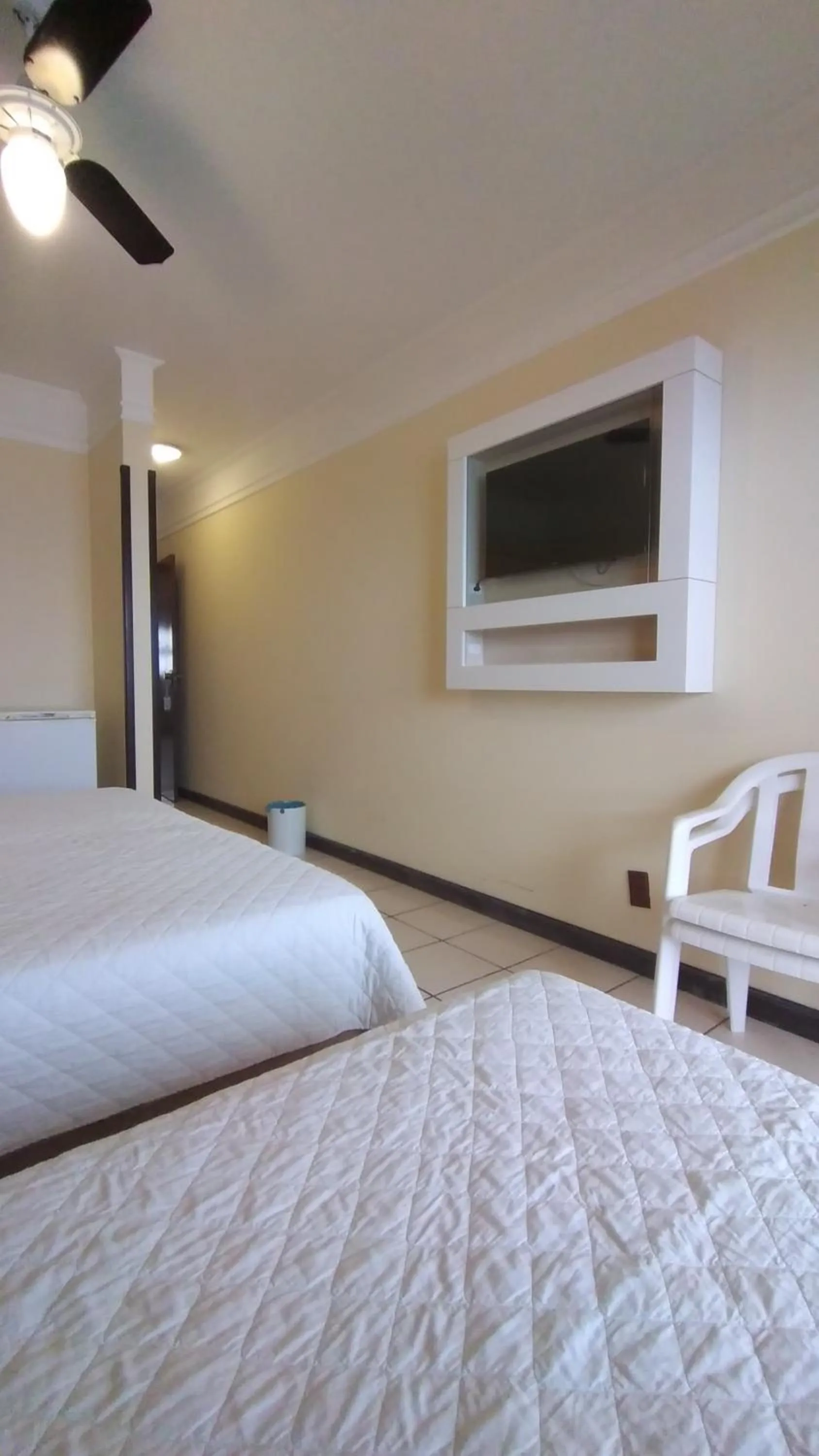 Bed in Hotel Araçá