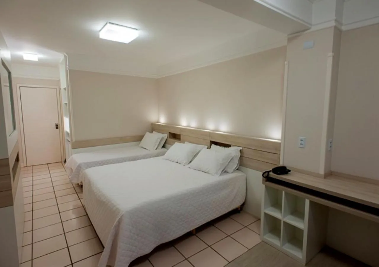 Bed in Hotel Araçá