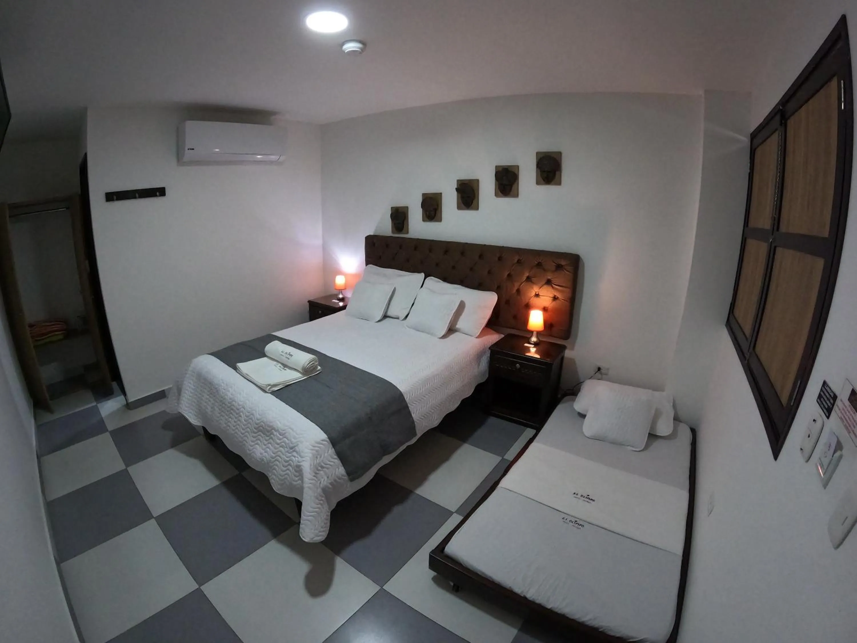 Bed in Hotel El Olimpo