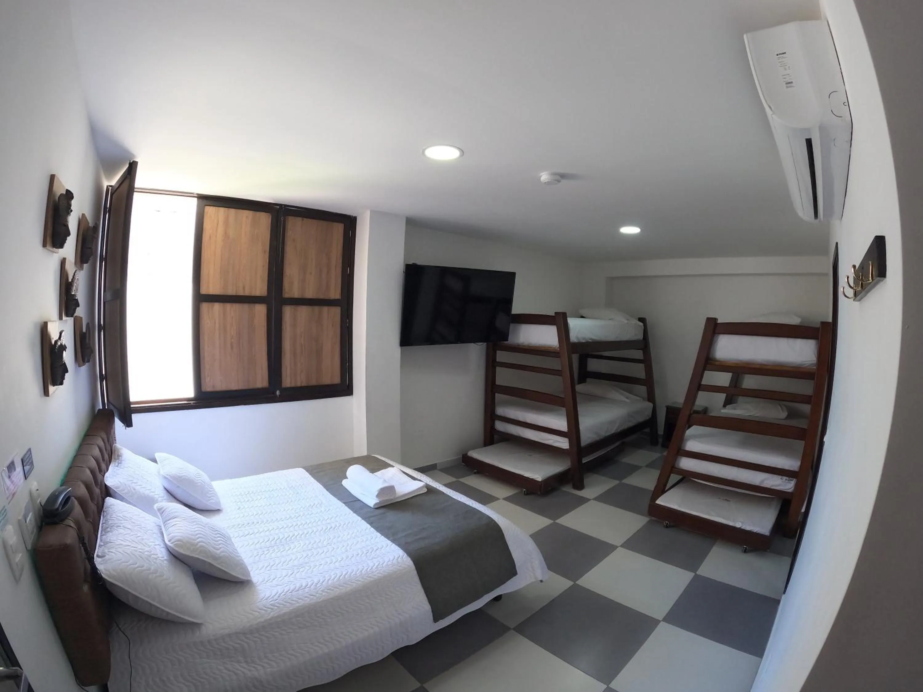 Bed in Hotel El Olimpo