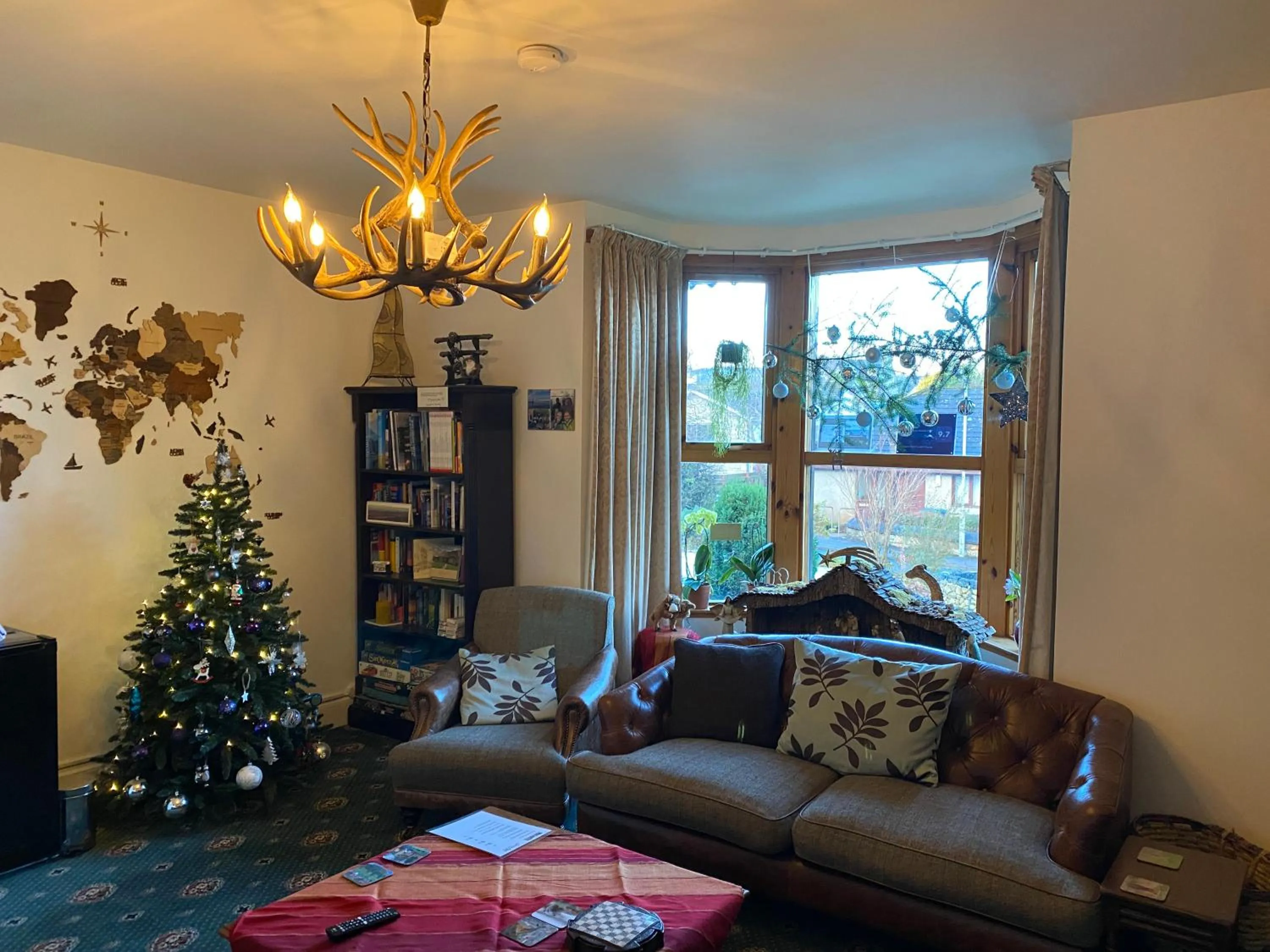 Communal lounge/ TV room in Garden Park Guest House