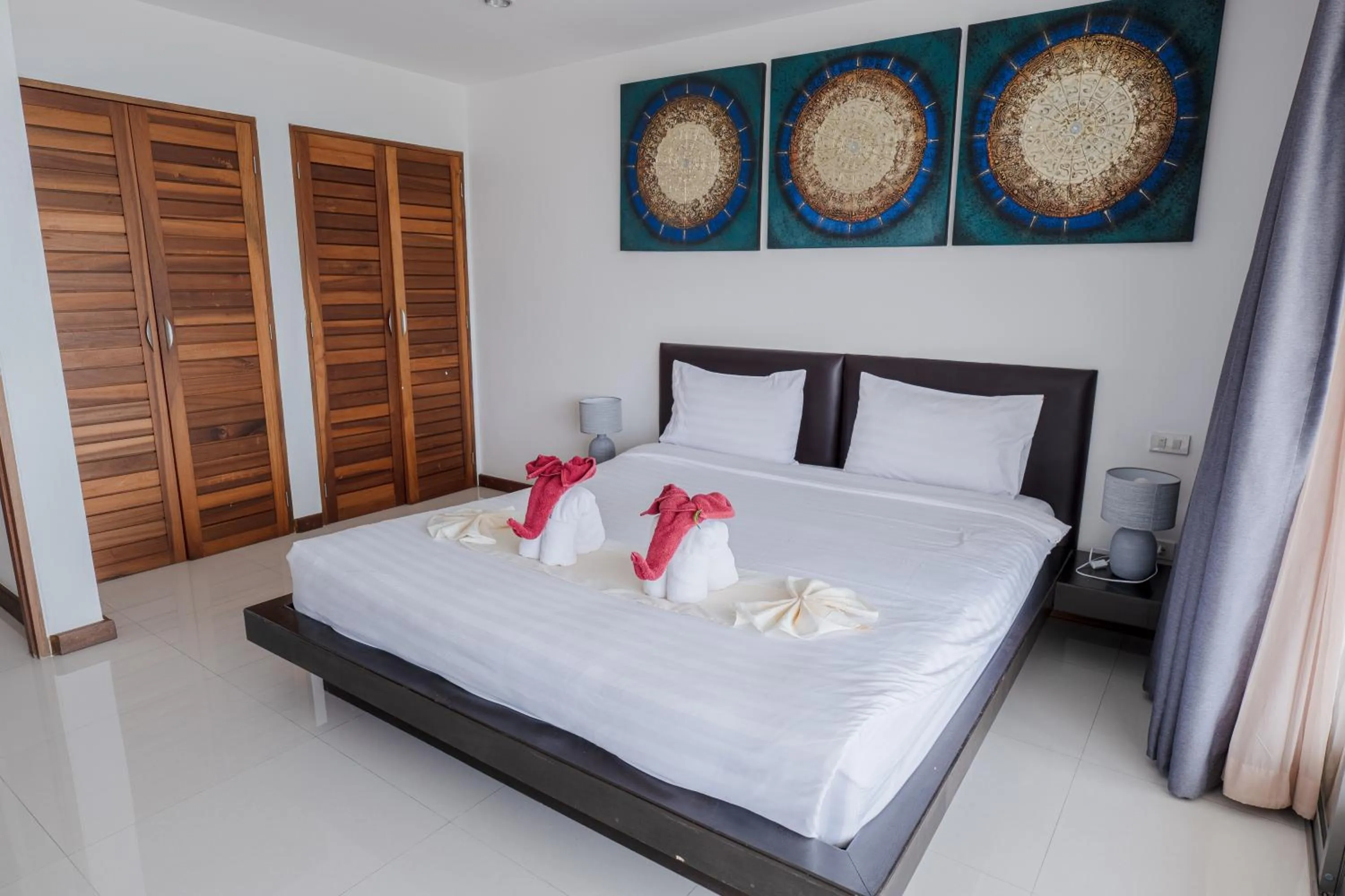 Bed in Tropical Sea View Residence