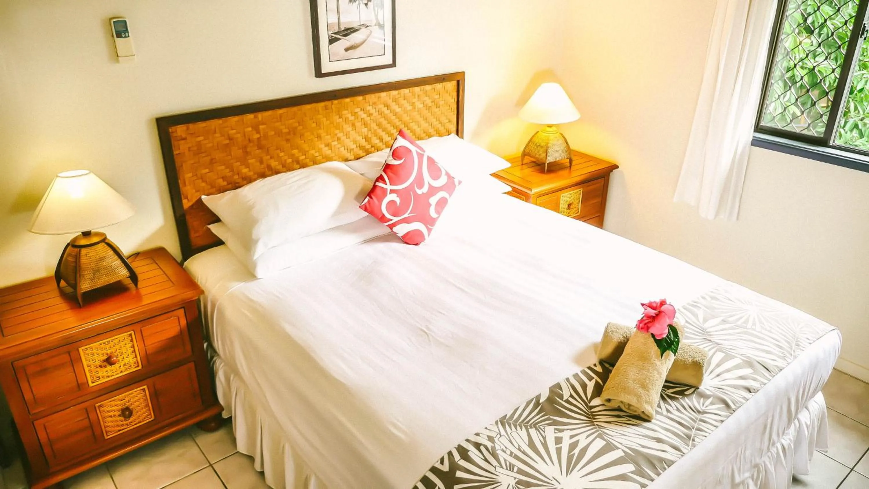 Shower, Bed in Muri Beach Resort