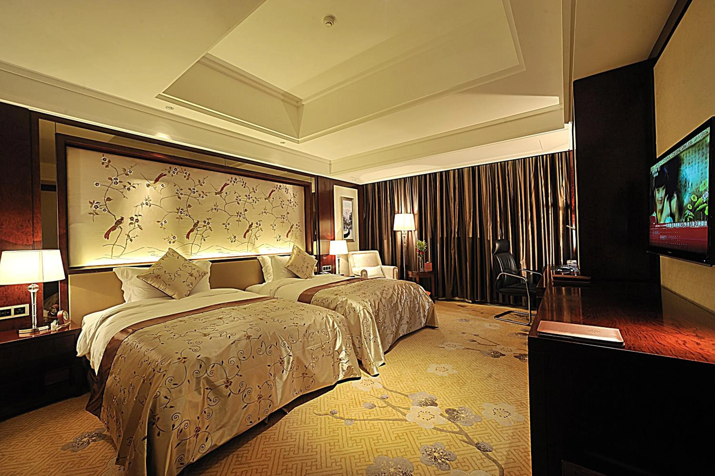 Bed in Tai Zhou International Jinling Hotel
