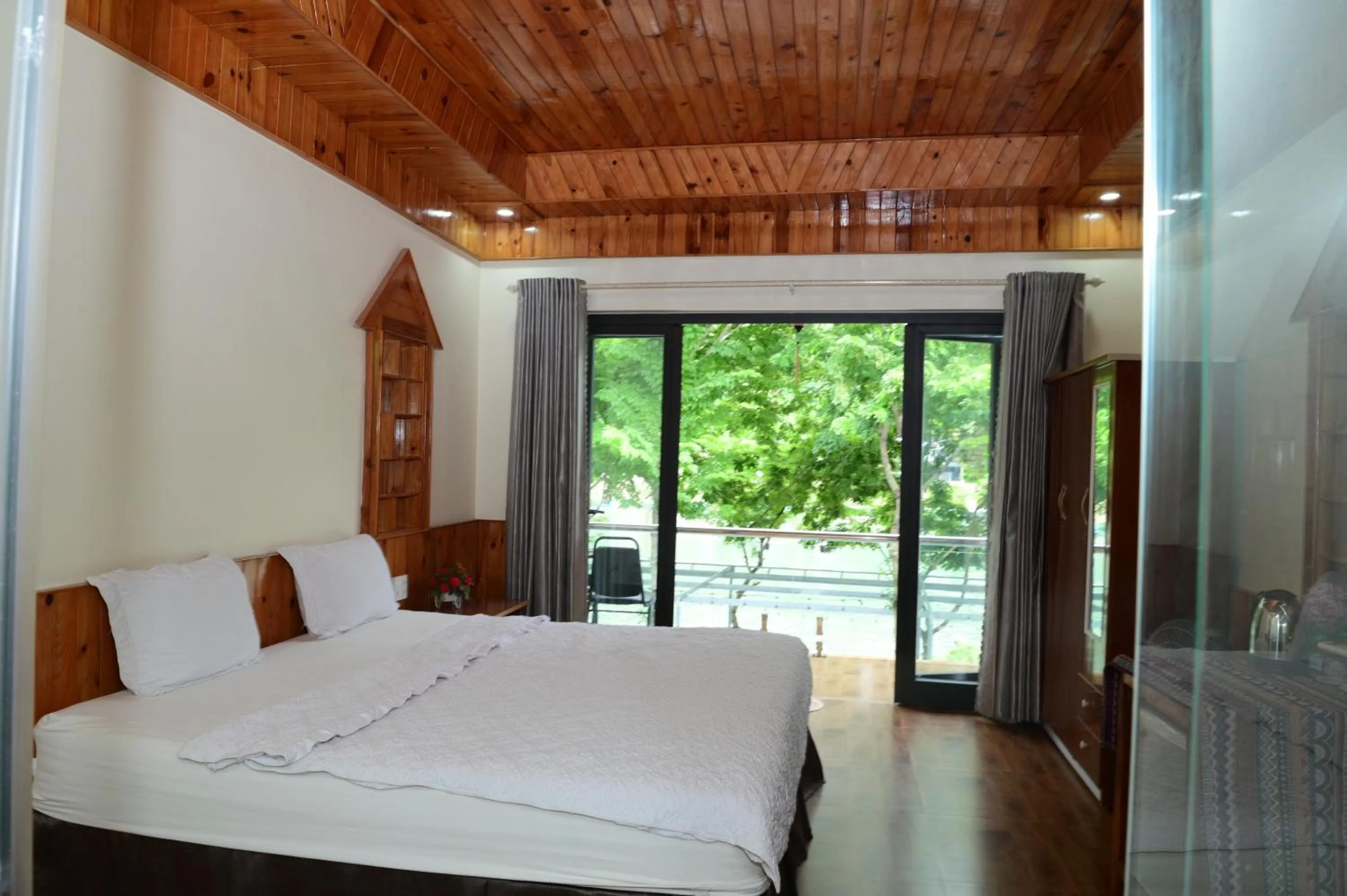 Bed in Restful River Bungalow
