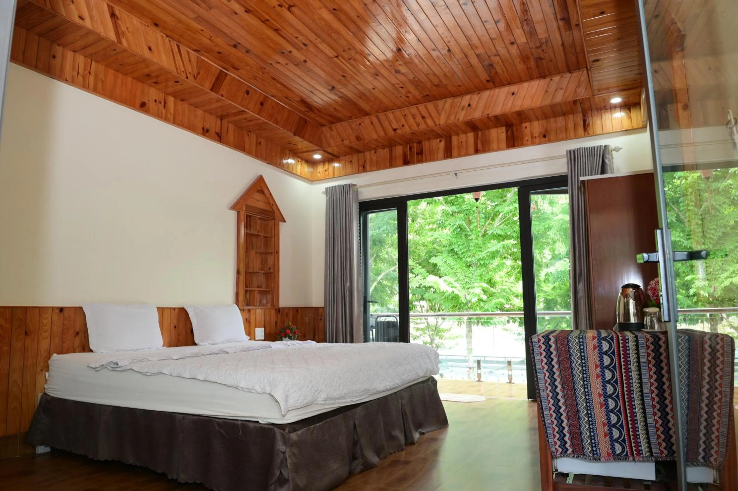 Bed in Restful River Bungalow