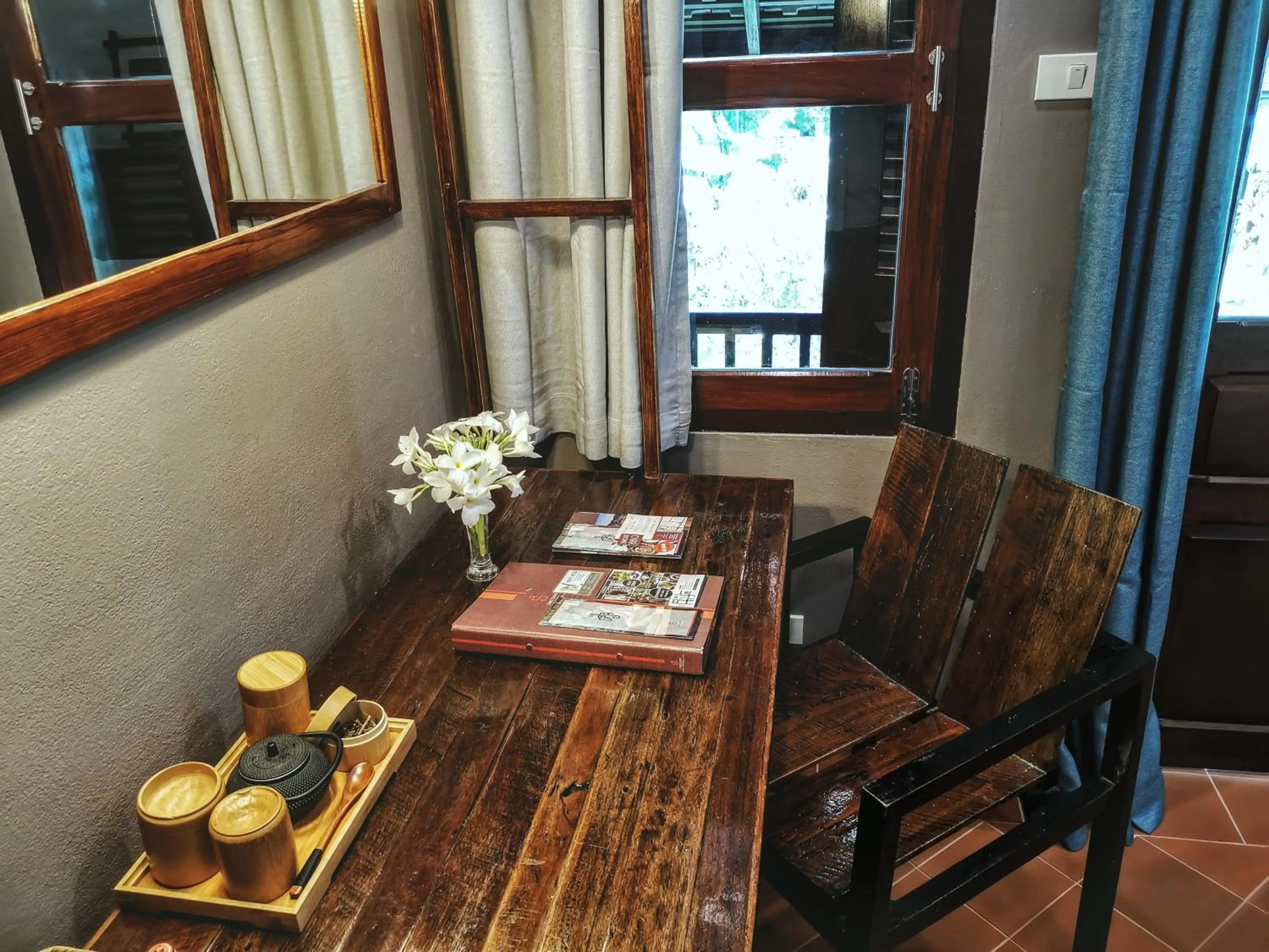 Seating area in Sanctuary Hotel Luang Prabang
