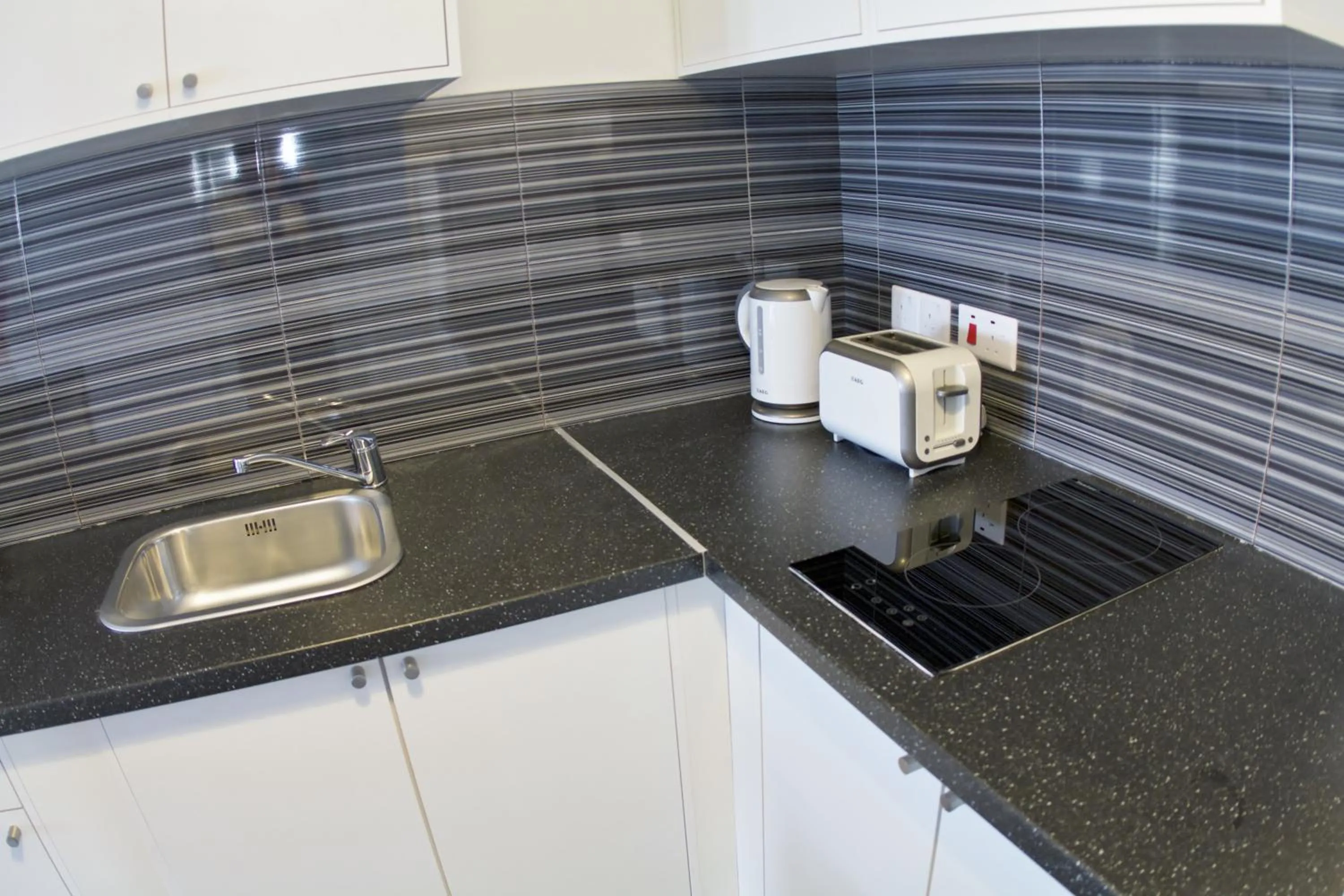 Kitchen or kitchenette in Margarita Napa Apartments