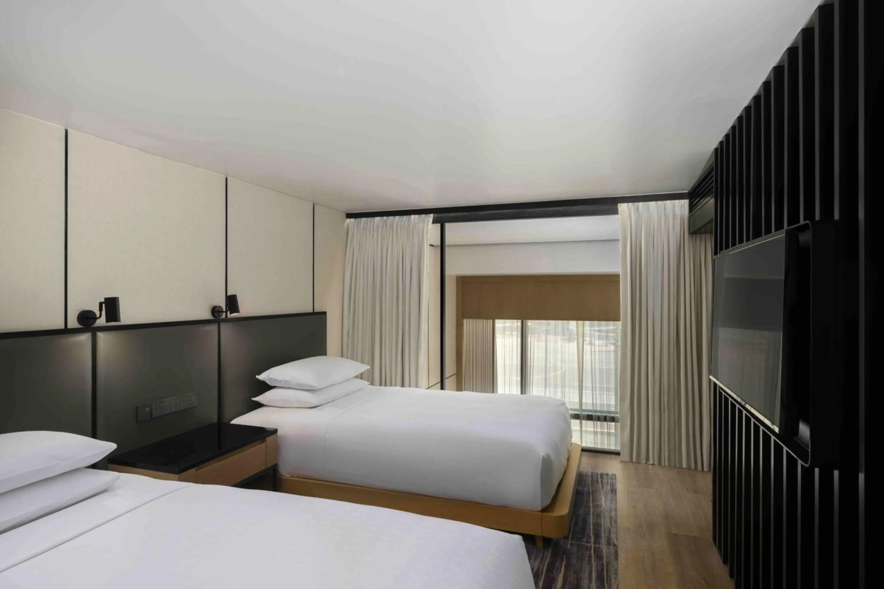 Photo of the whole room, Bed in Sheraton Manila Hotel at Newport World Resorts