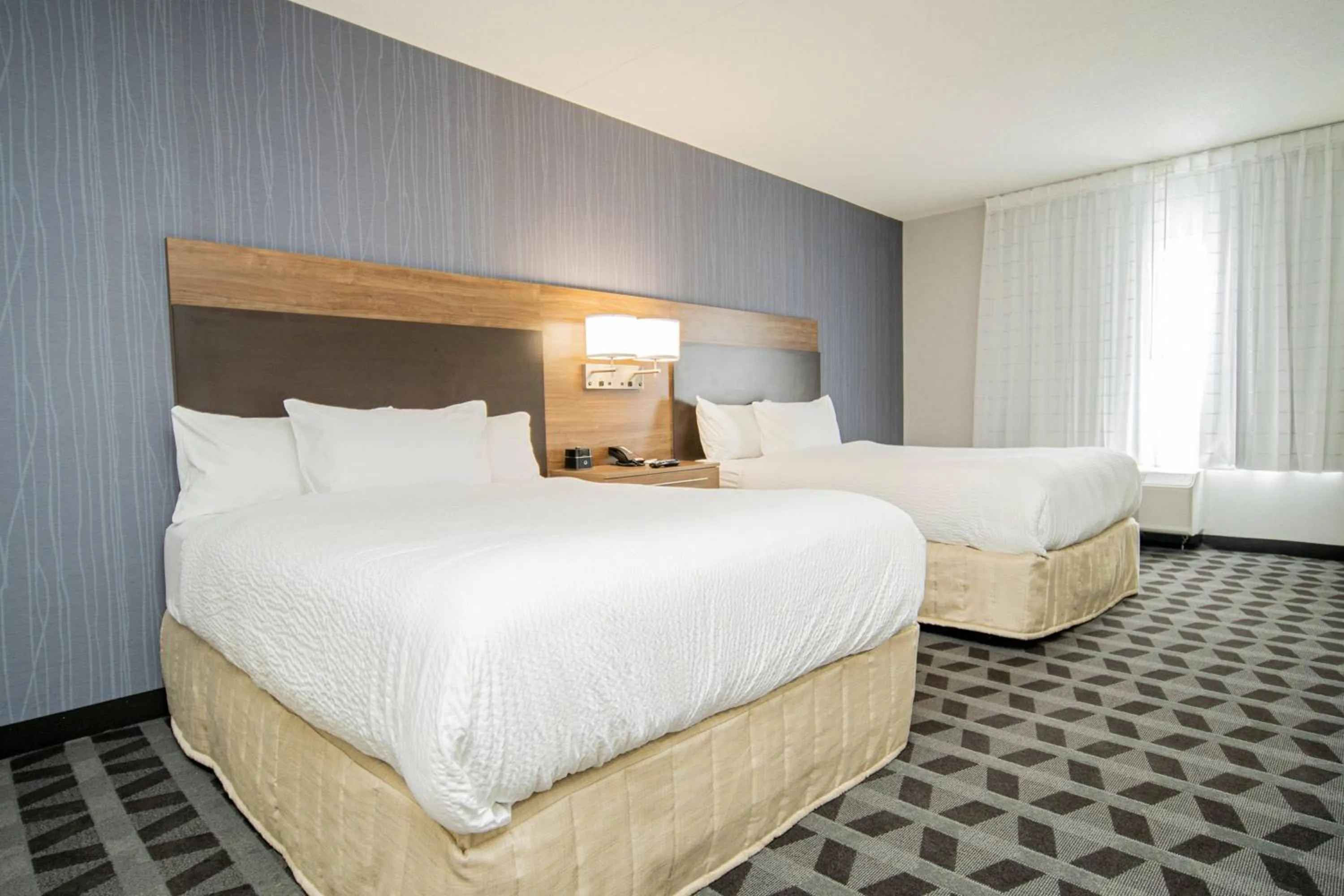 Photo of the whole room, Bed in TownePlace Suites by Marriott Brantford and Conference Centre