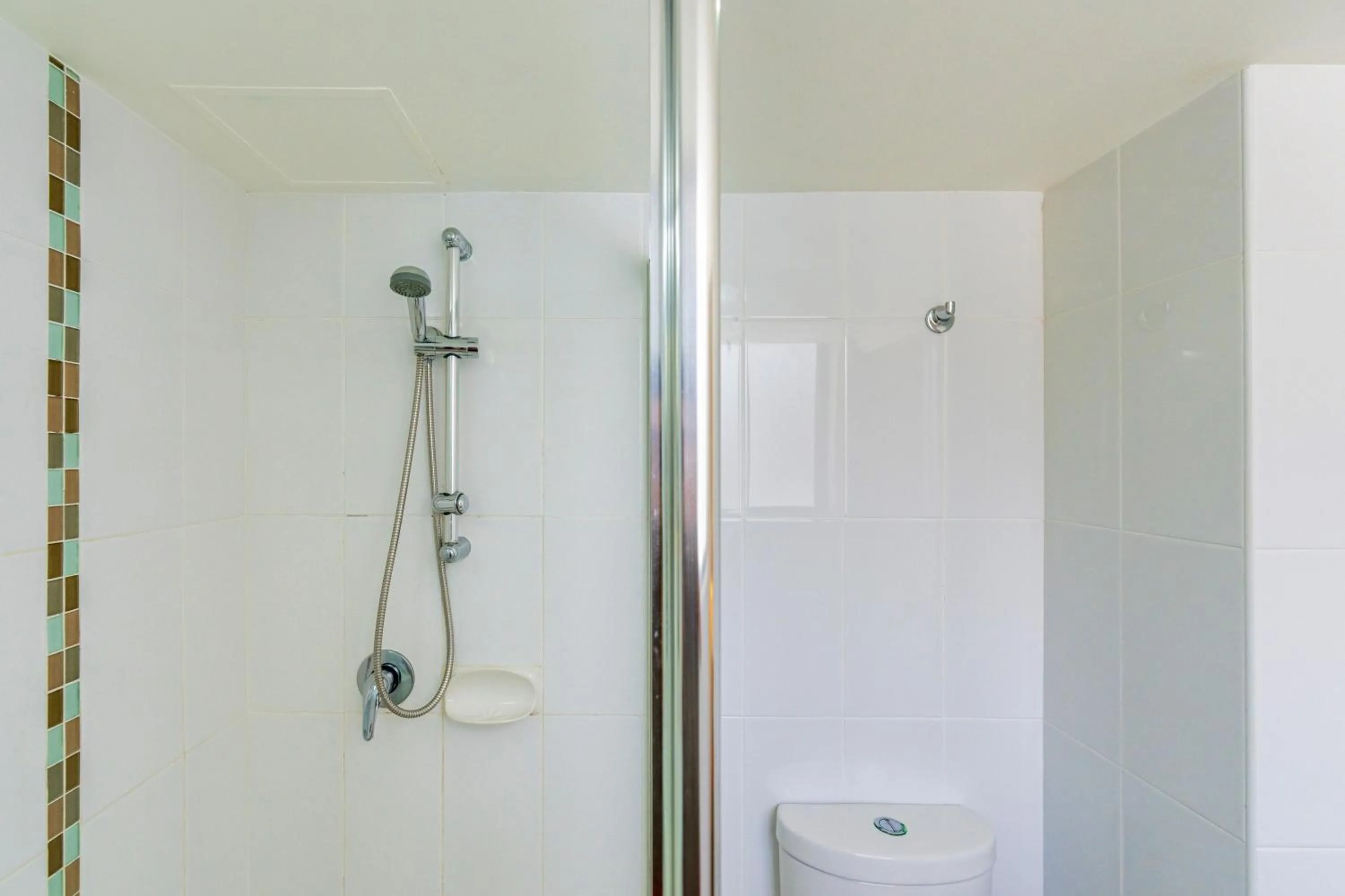 Bathroom in Olympus Beachfront Apartments