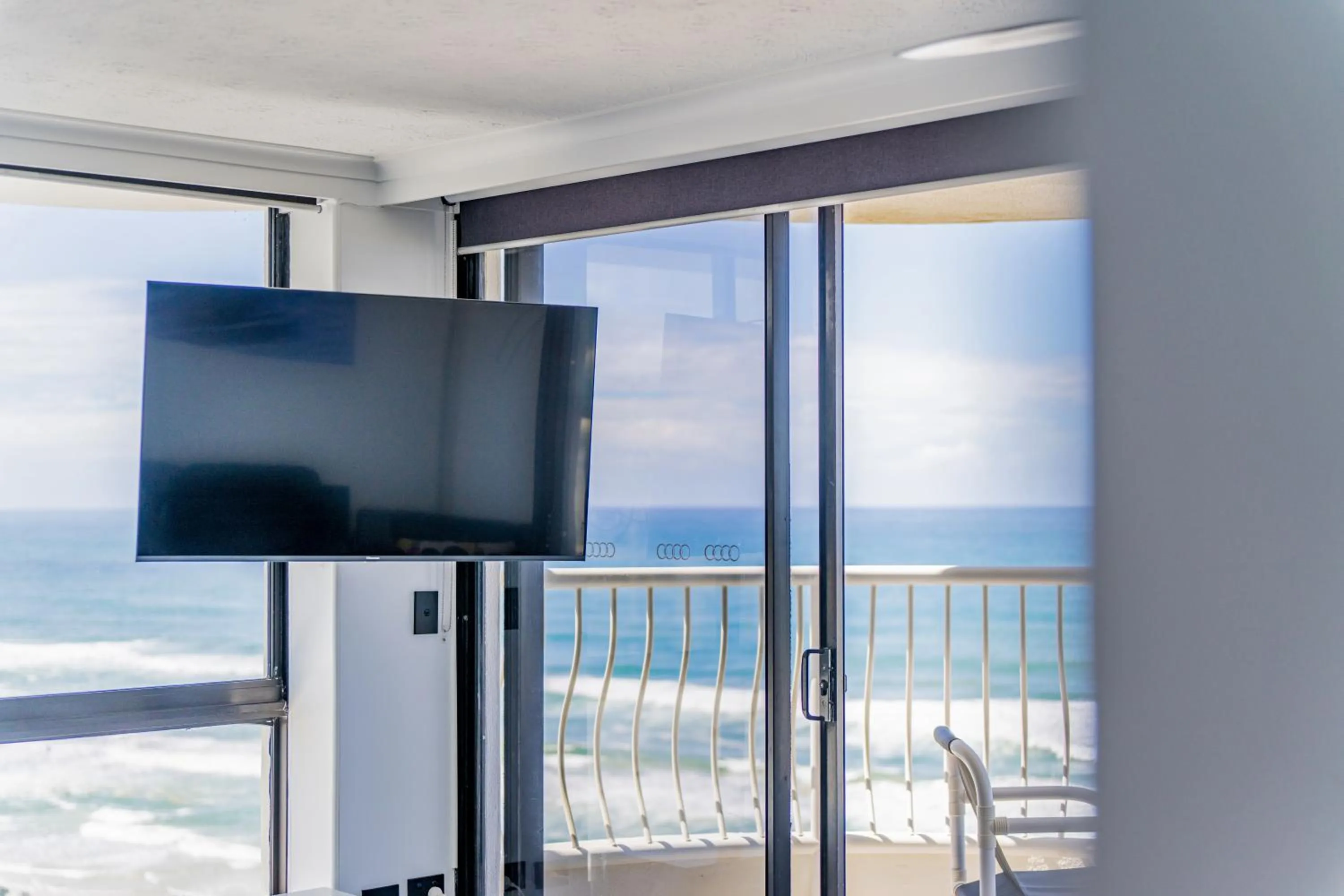 Living room in Olympus Beachfront Apartments